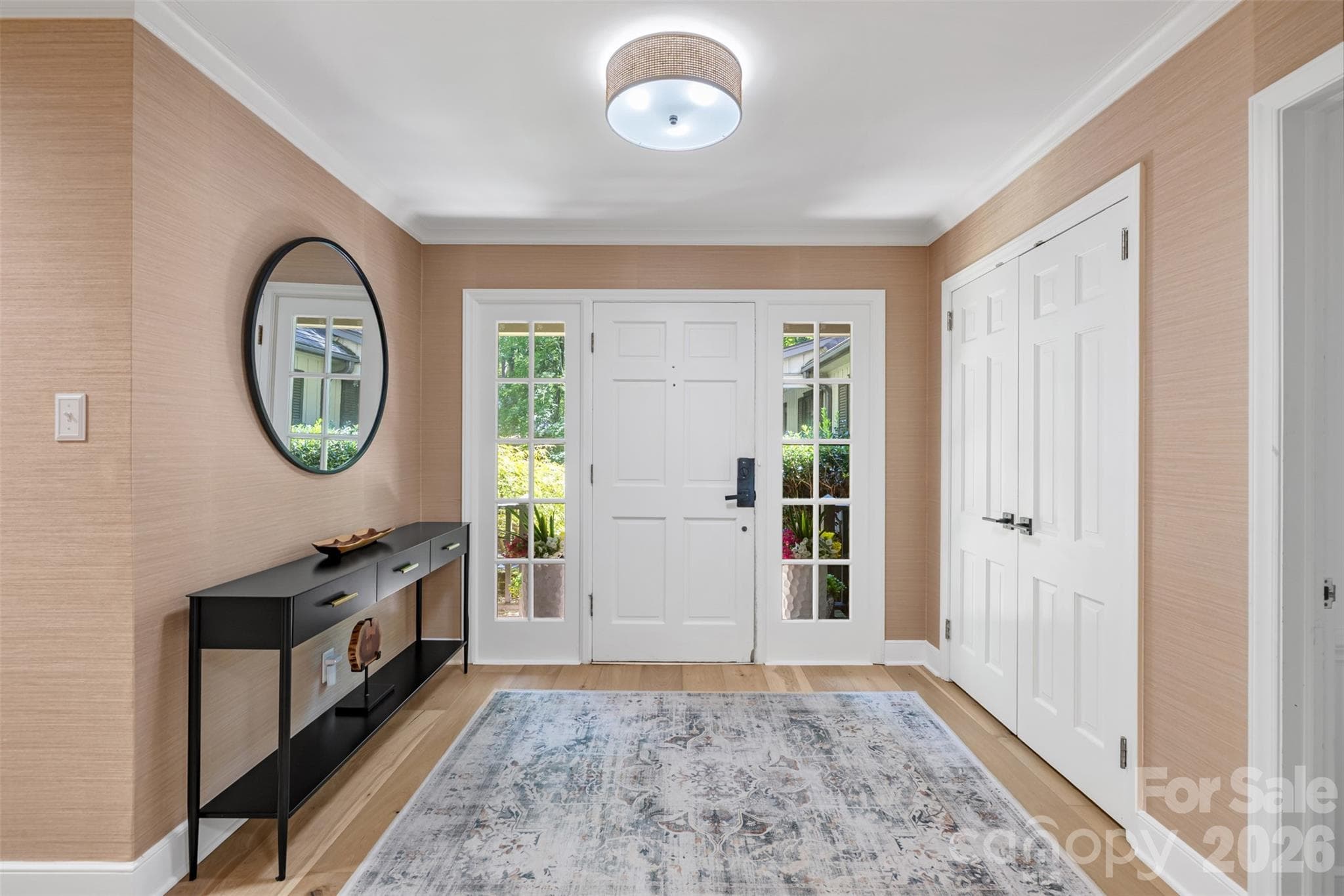 Welcoming grasscloth covered foyer - 10 Bald Eagle Road, Lake Wylie