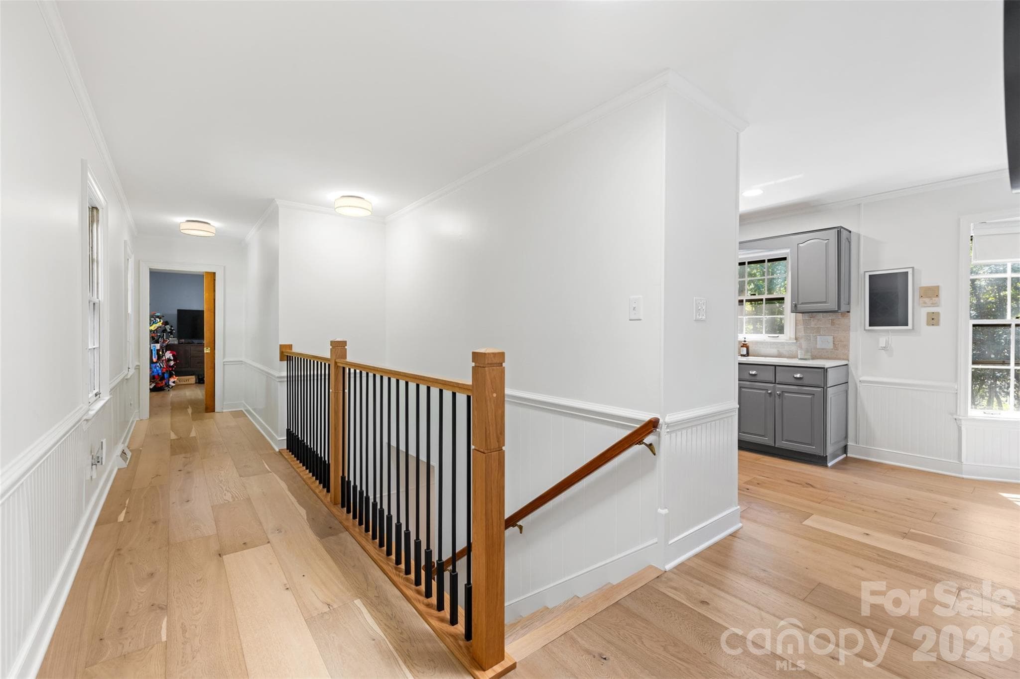 Updated balusters to lead you to the walk out basement bedroom - 10 Bald Eagle Road, Lake Wylie