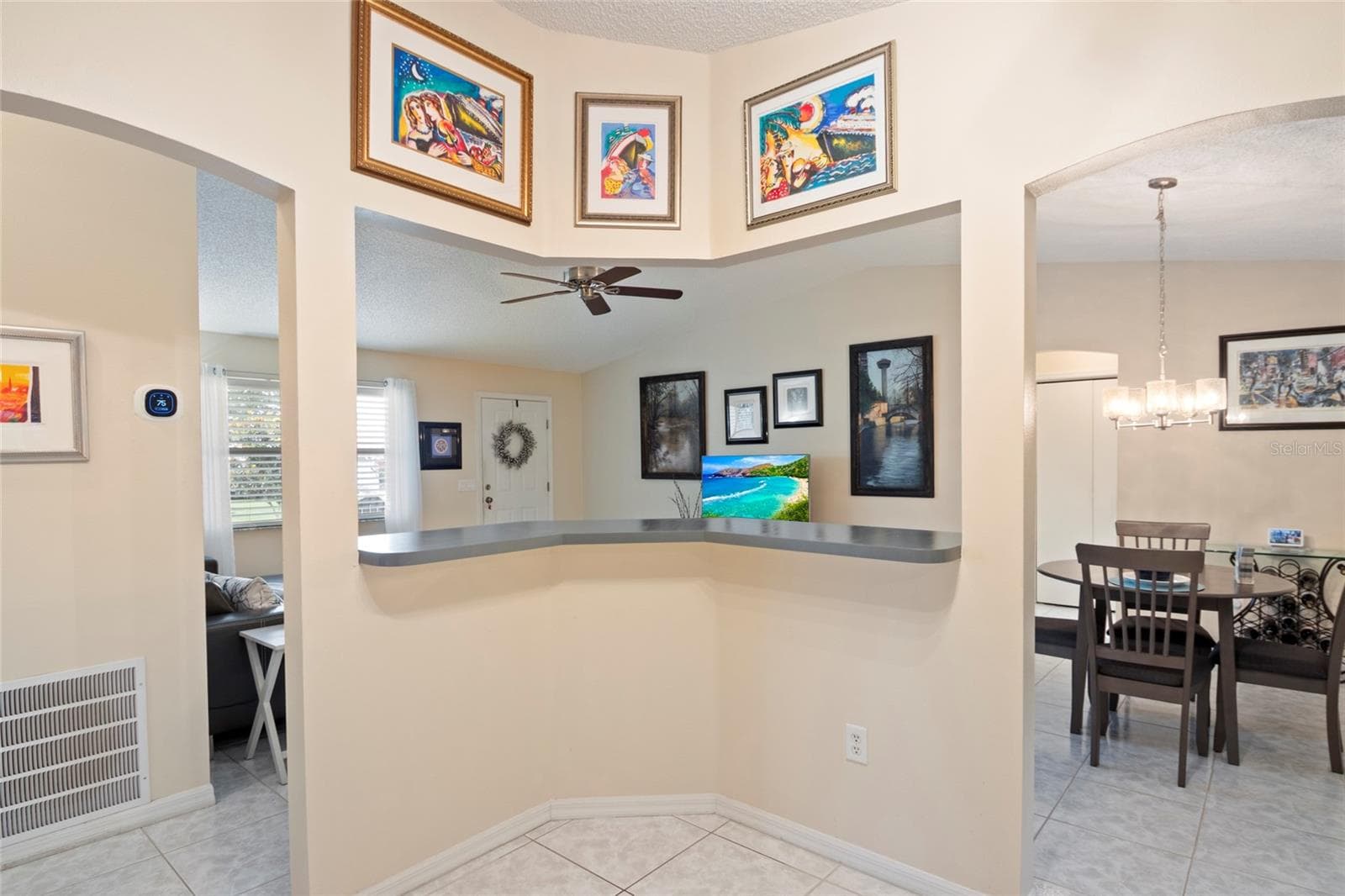 Open Bar Area from Kitchen to Living/Dining Areas - 672 SAN PEDRO DR, THE VILLAGES