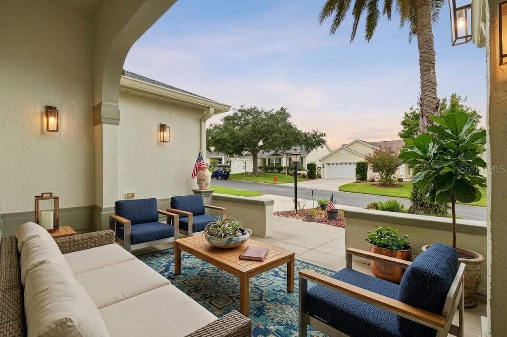 front patio, virtual staged - 438 TROY LOOP, THE VILLAGES