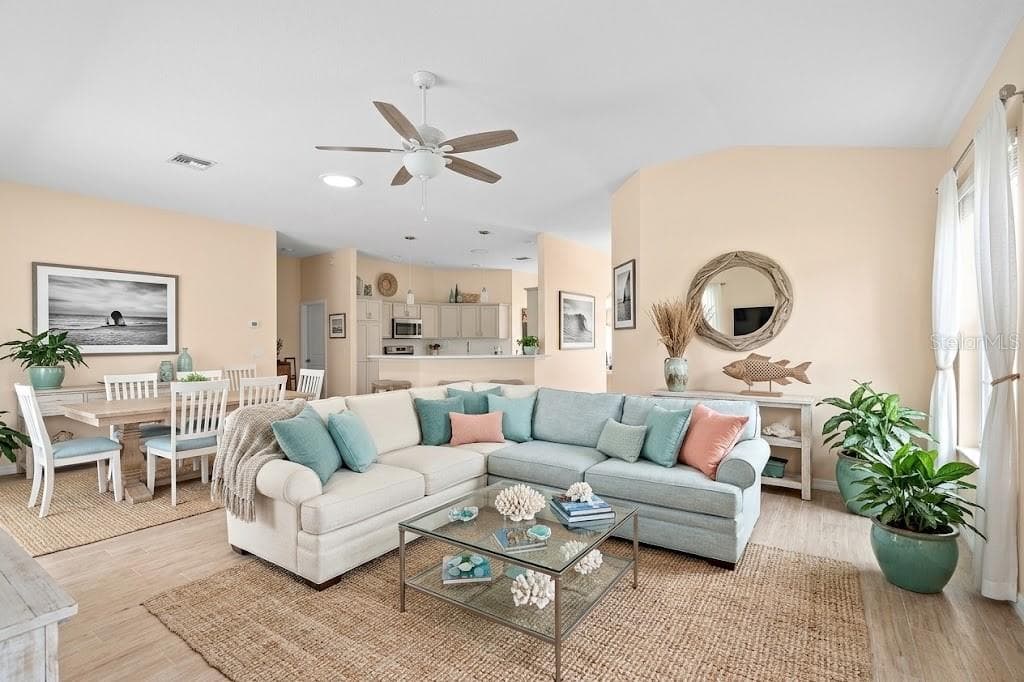 virtual stagged living room - 438 TROY LOOP, THE VILLAGES