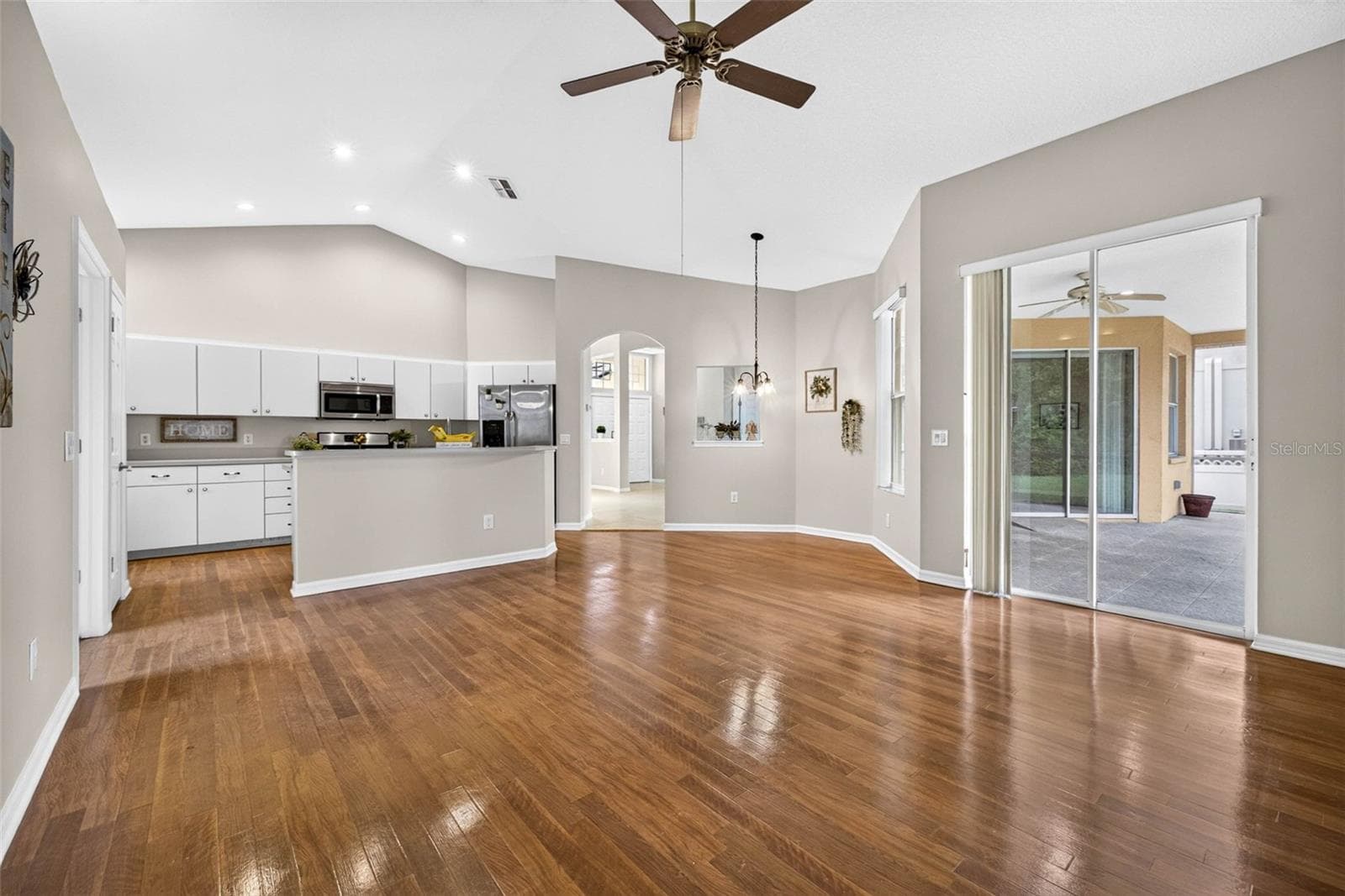 VIEW OF KITCHEN FROM FAMILY ROOM - 9603 BIRNAMWOOD ST, RIVERVIEW