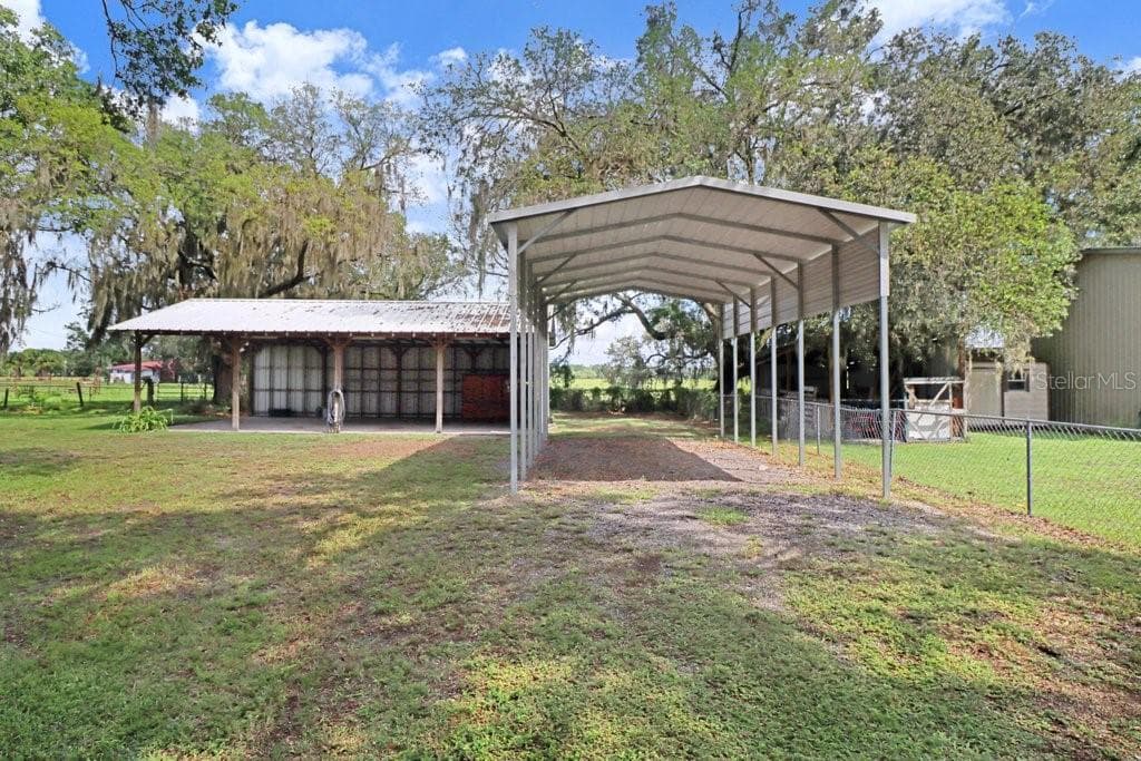 Bring your toys! LARGE RV carport and Pole Barn Workshop - 13108 LILITA AVE, DOVER