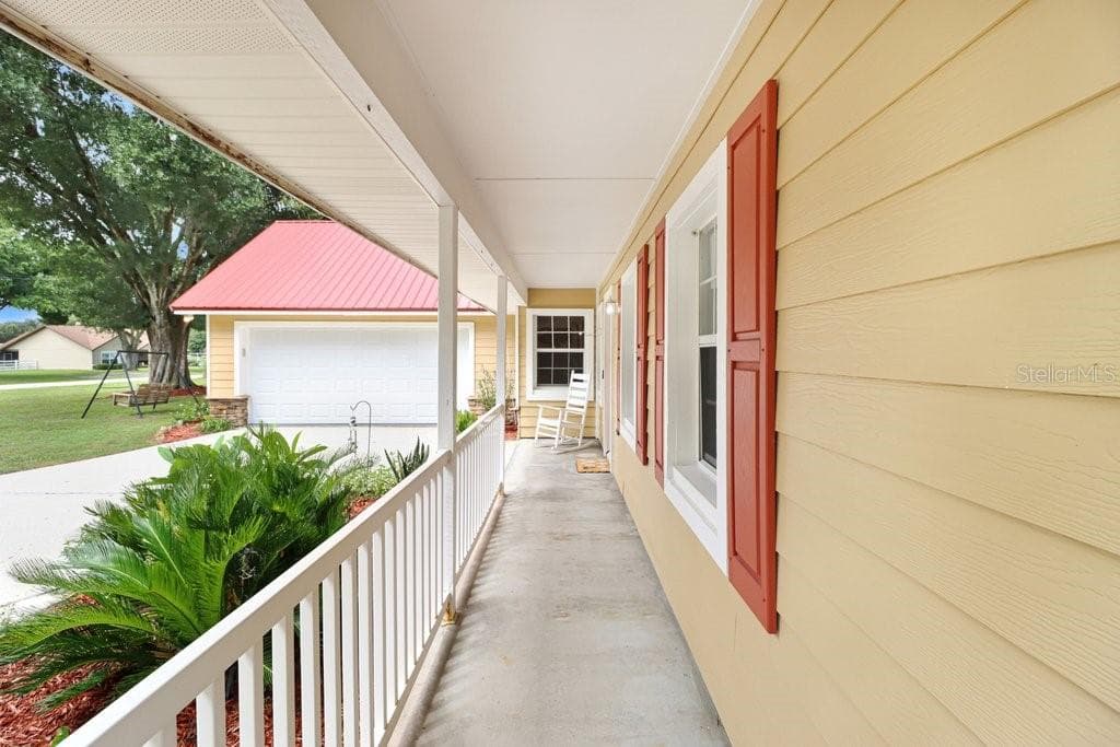 Front porch sitting - 13108 LILITA AVE, DOVER