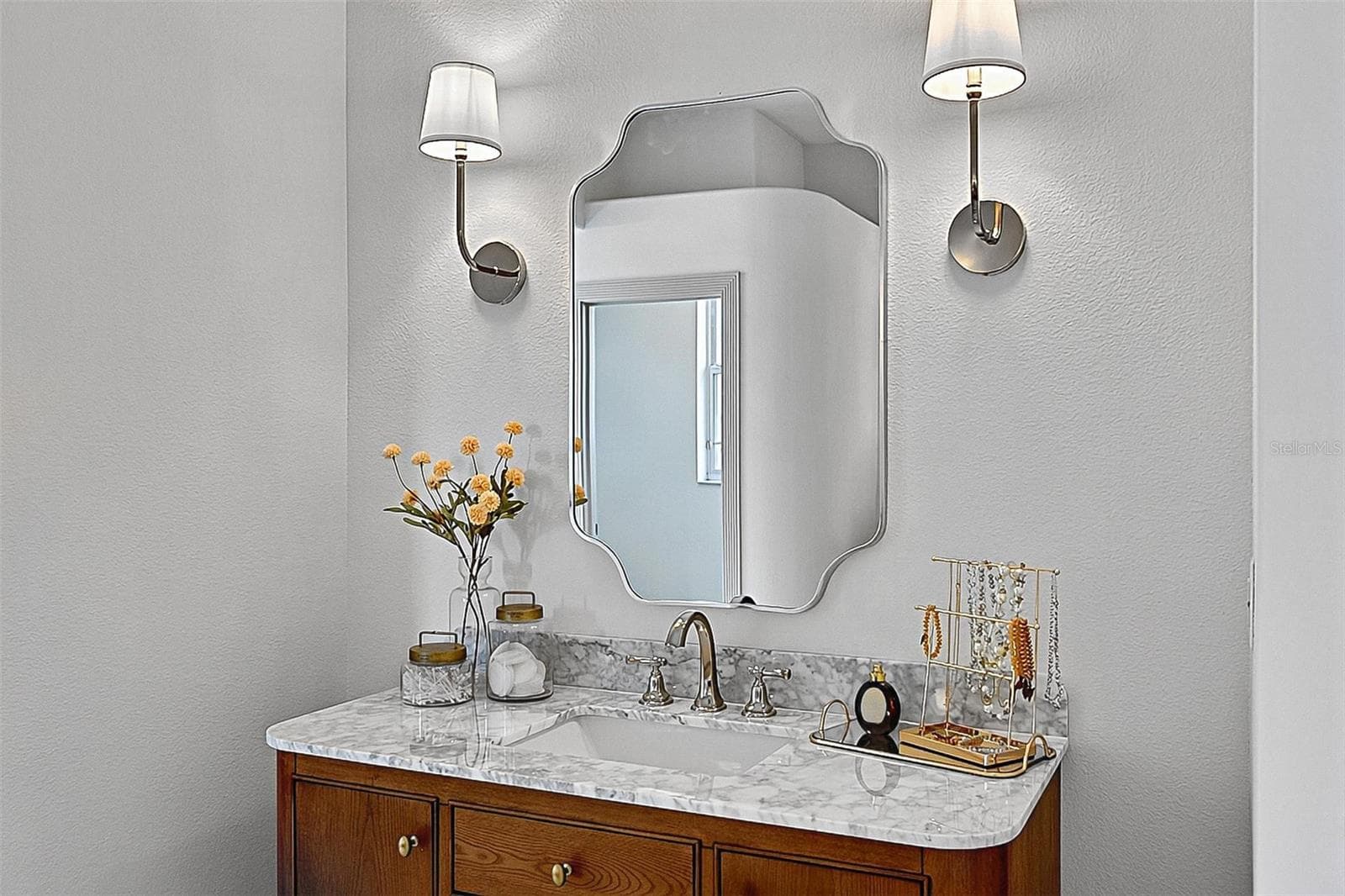 Master Bathroom with wood side ladies stone top with wood vanity - 17 GRANDVIEW DR, PALM COAST