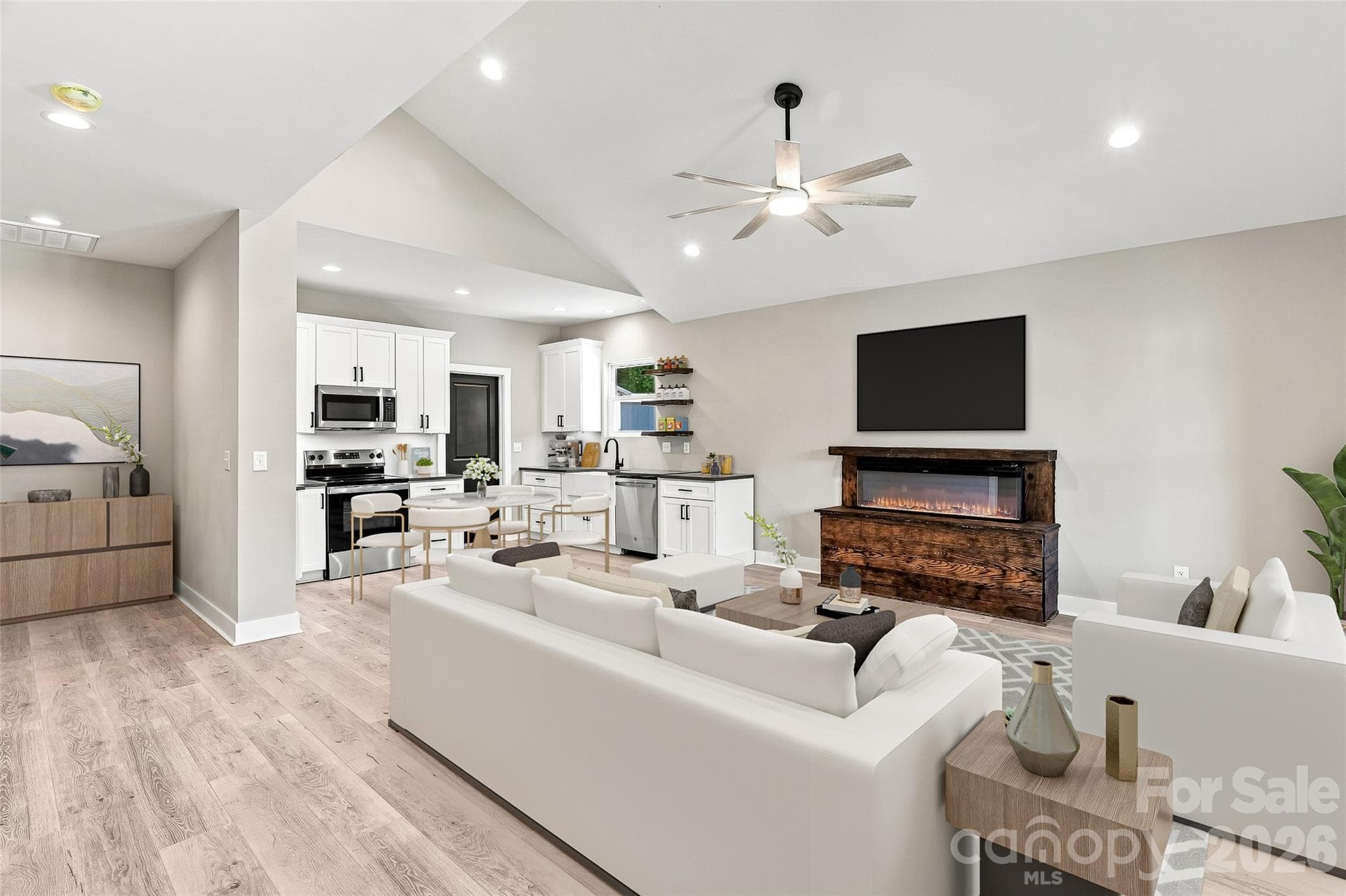 Open living room kitchen and hall (furniture staged with AI) - 156 Edwards Avenue, Swannanoa