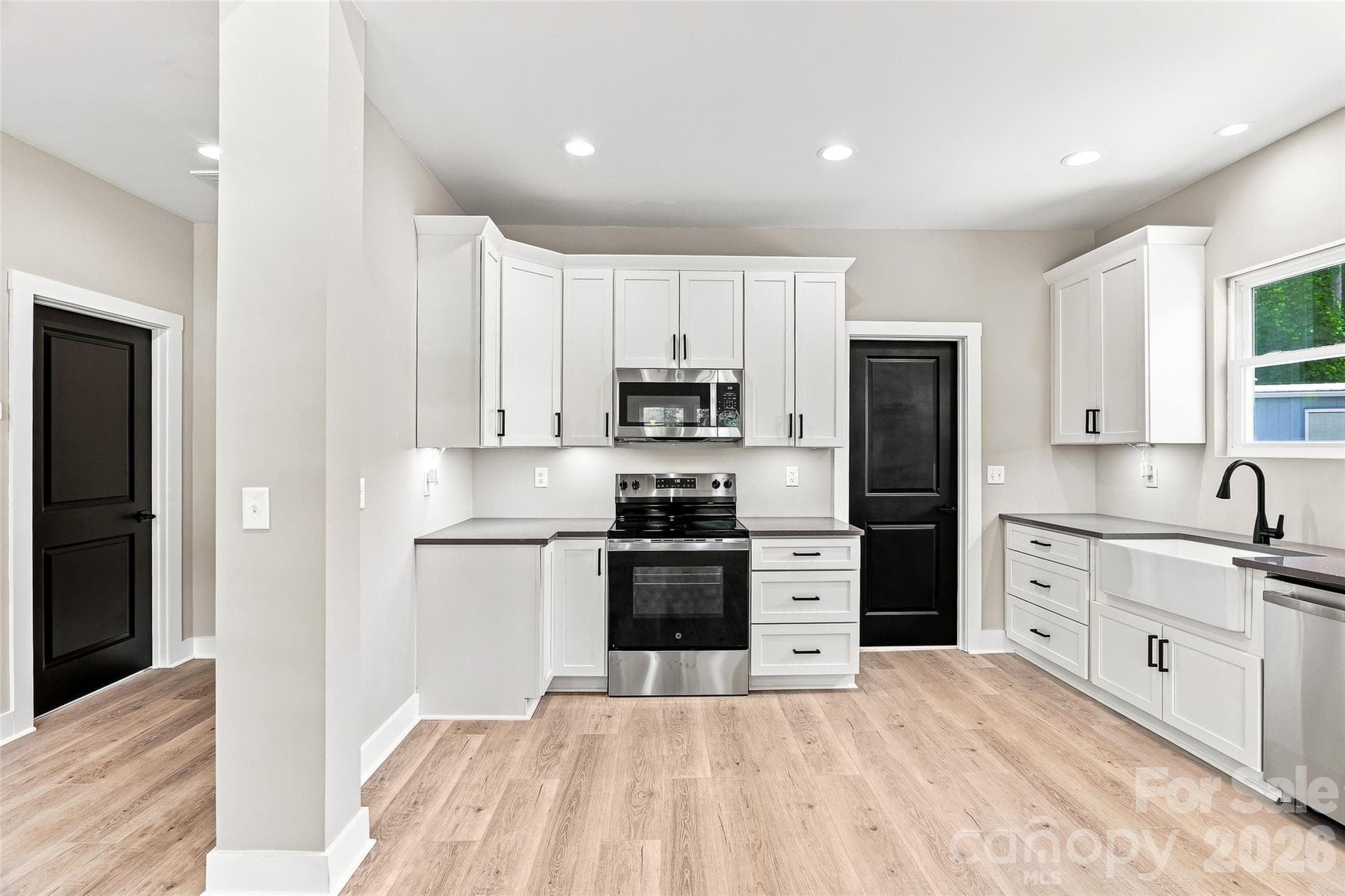 View of kitchen from the living area - 156 Edwards Avenue, Swannanoa