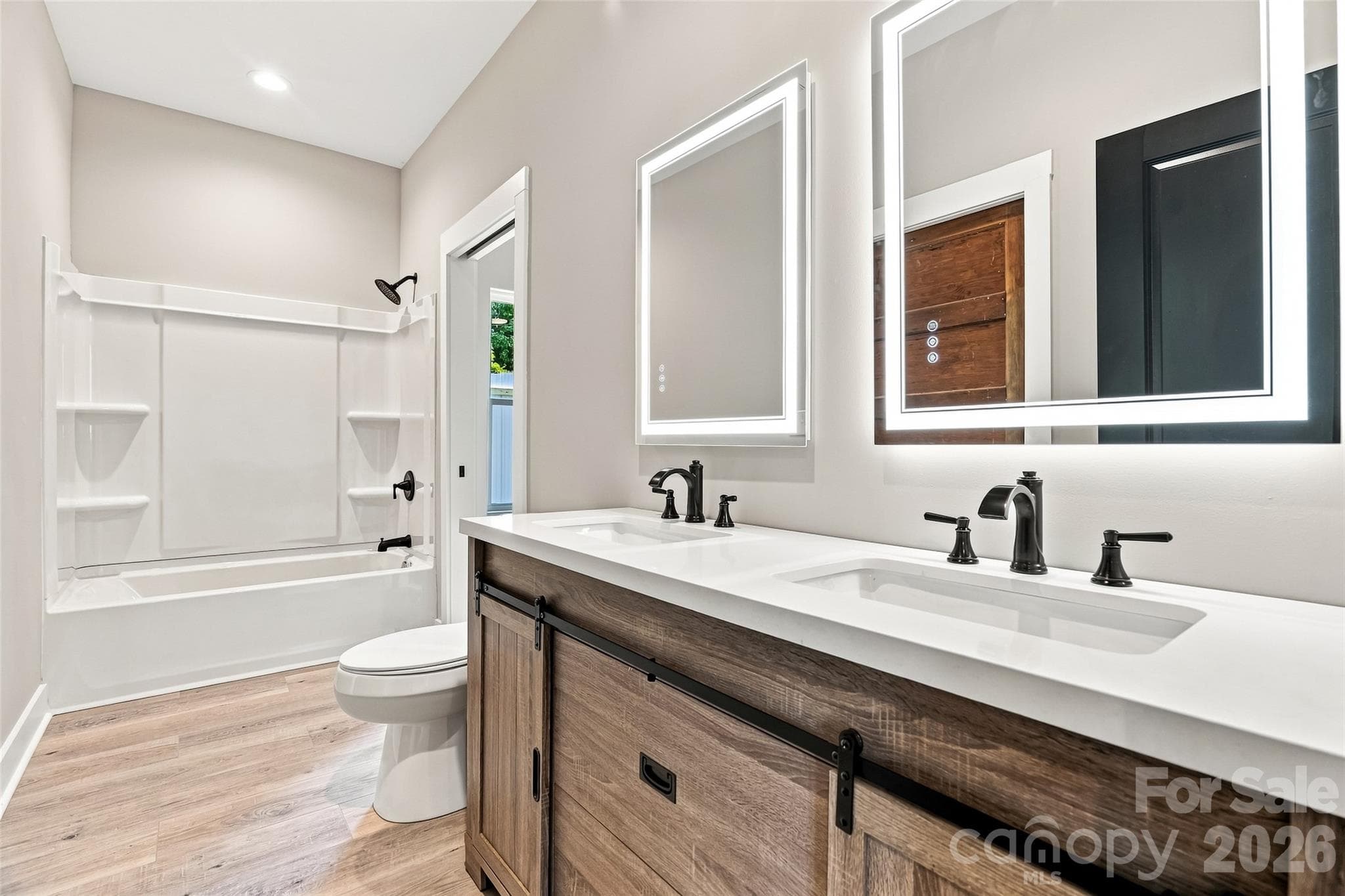 Jack and Jill bathroom accessible from living area along with bedrooms 1 and 2. - 156 Edwards Avenue, Swannanoa