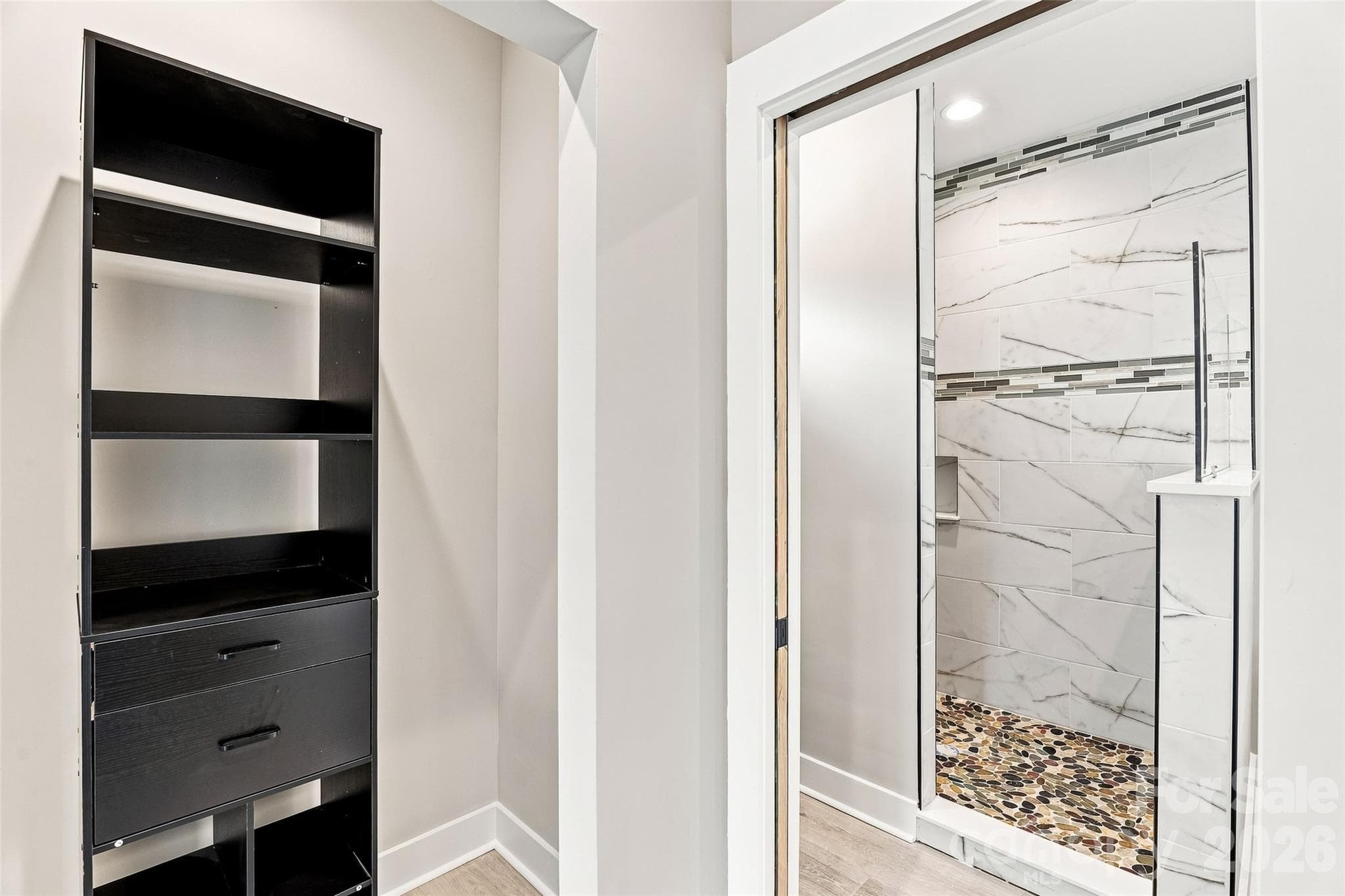 Double closets spaces in primary suite - 156 Edwards Avenue, Swannanoa