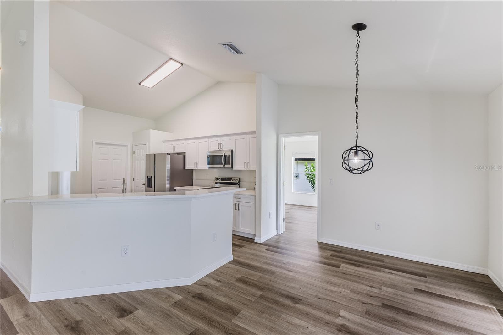 VIEW TO KITCHEN AND DINING - 2505 56TH ST W, LEHIGH ACRES