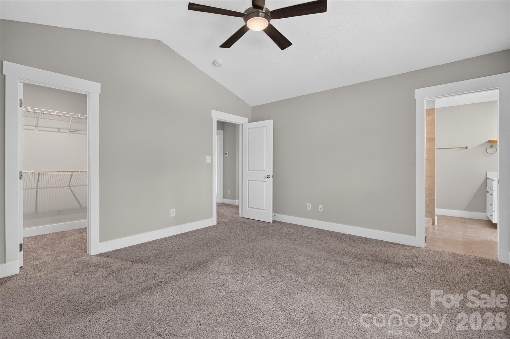 Primary bedroom with walk-in closet & dual vanity full bath - 134 Shelburne Road, Asheville