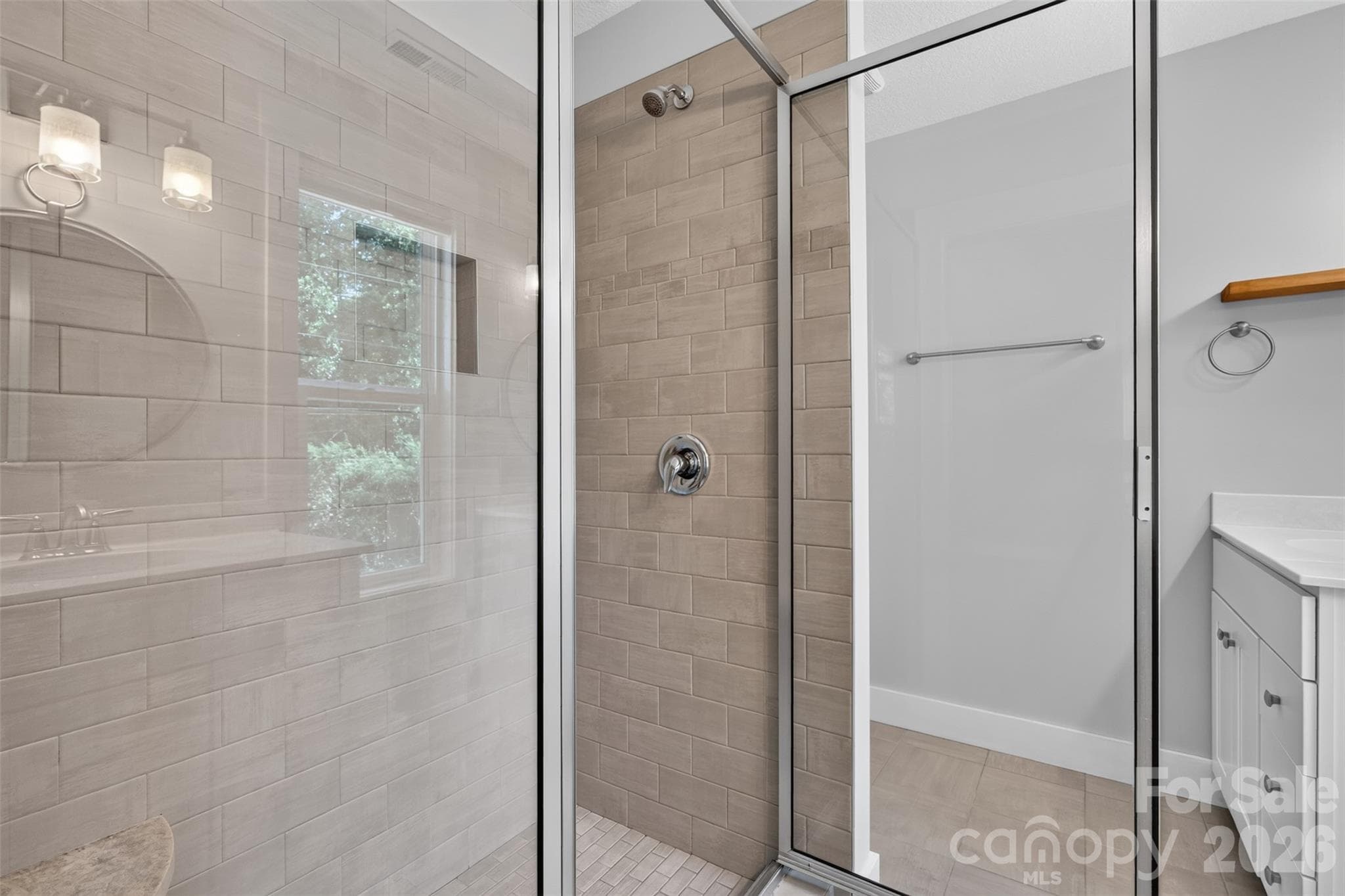 Large tiled shower in primary bathroom - 134 Shelburne Road, Asheville