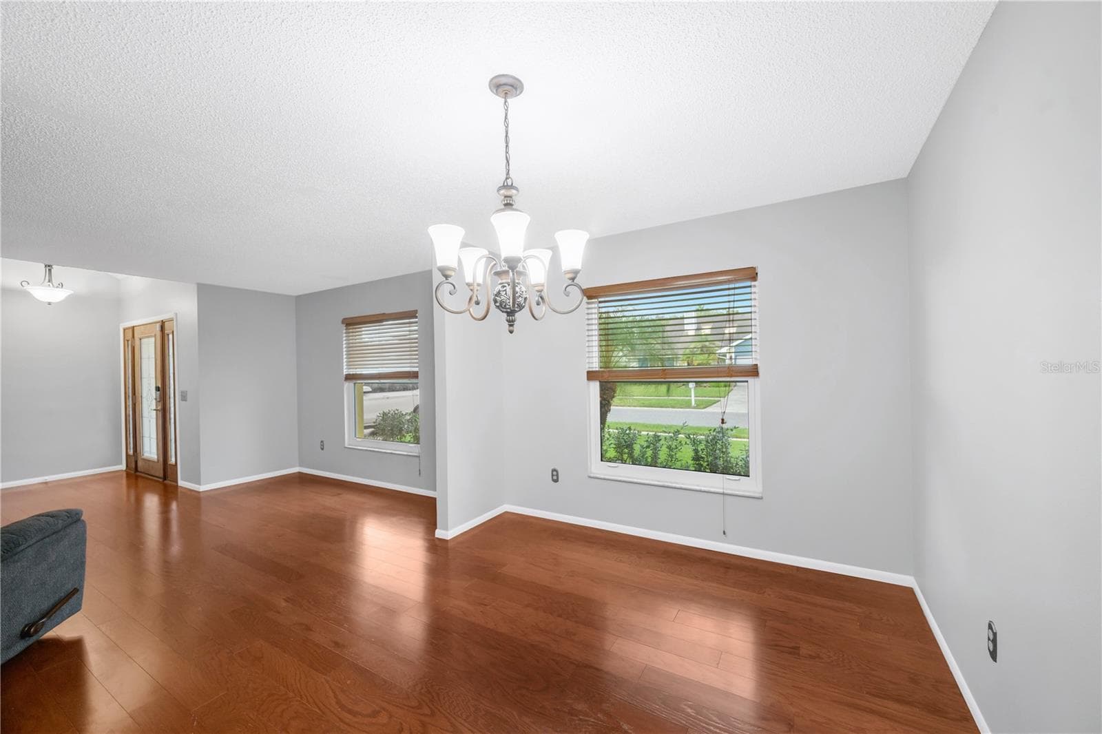 Additional living areas include a living room and a dining room next to the kitchen. - 1418 SHELL FLOWER DR, BRANDON