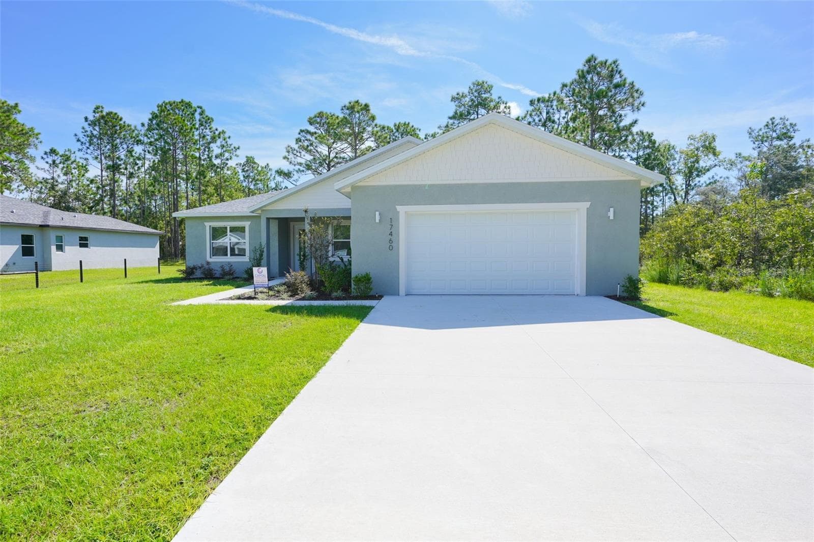 Front Exterior - 17460 MACASSAR RD, WEEKI WACHEE