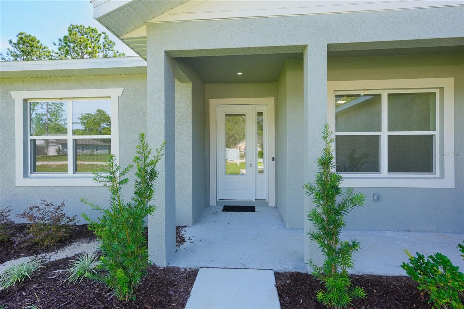 Front Exterior - 17460 MACASSAR RD, WEEKI WACHEE