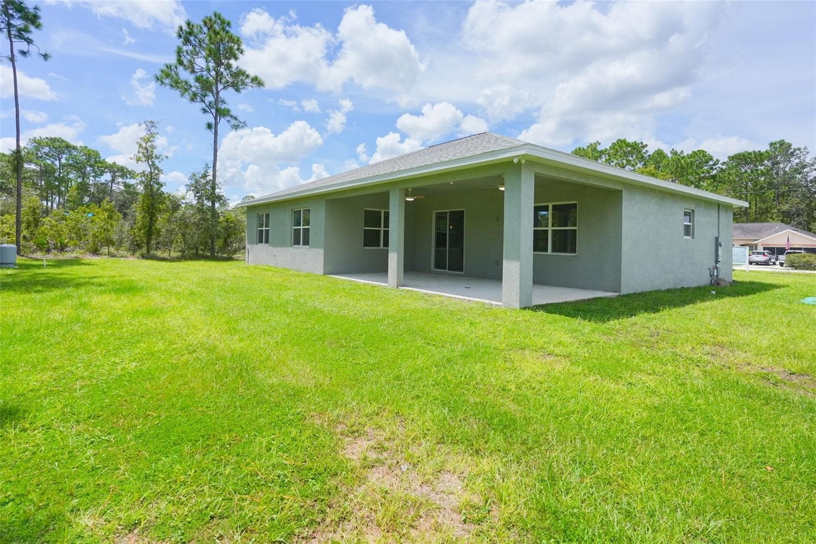 Rear Exterior - 17460 MACASSAR RD, WEEKI WACHEE