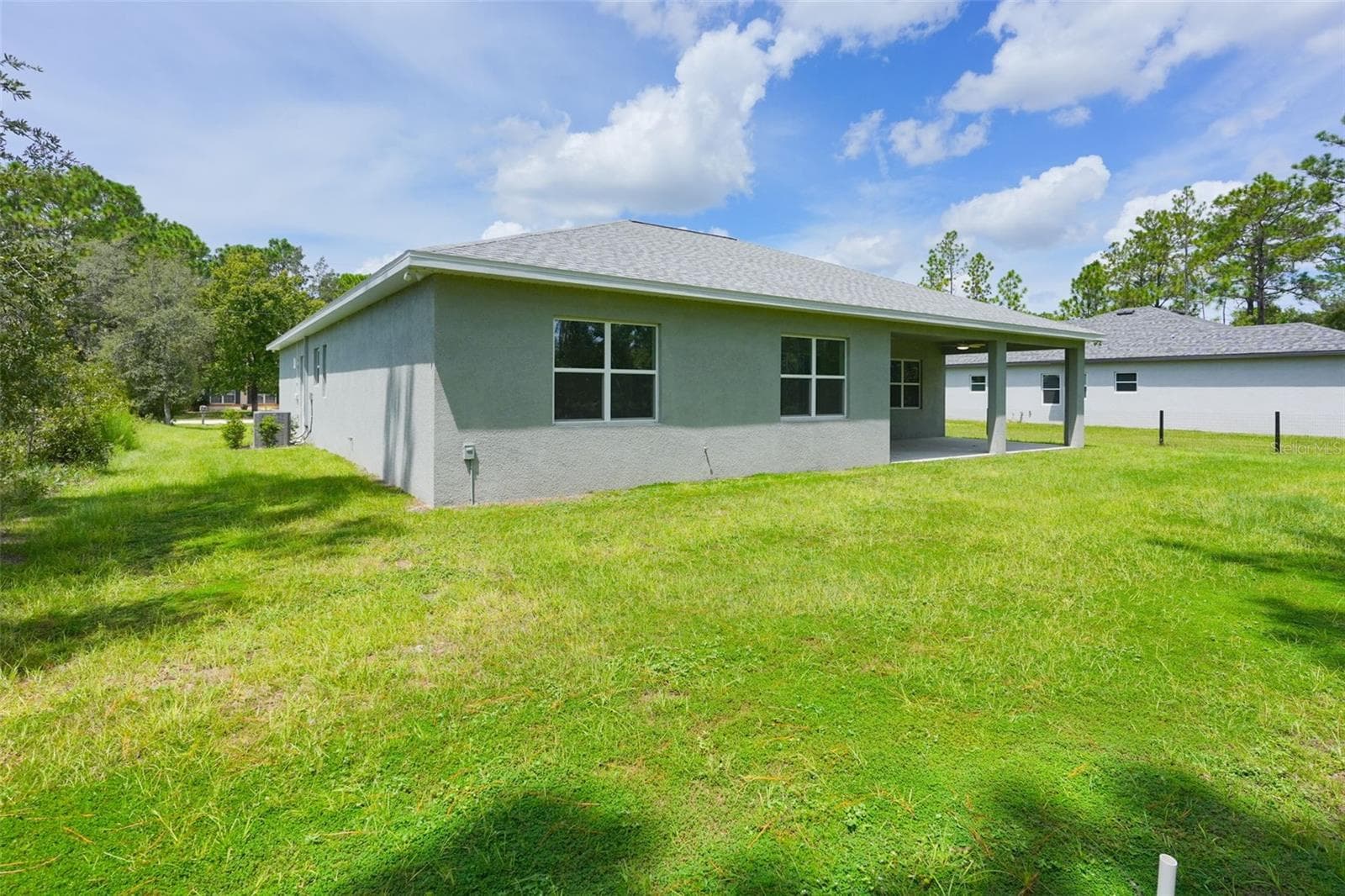 Rear Exterior - 17460 MACASSAR RD, WEEKI WACHEE