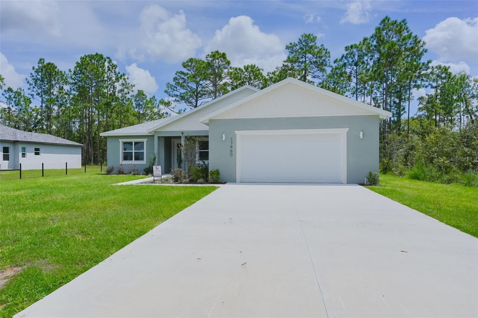 Front Exterior - 17460 MACASSAR RD, WEEKI WACHEE