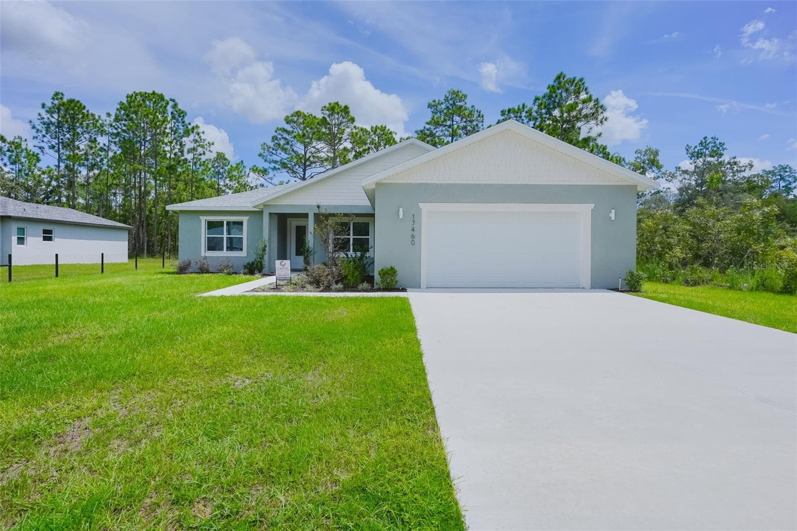 Front Exterior - 17460 MACASSAR RD, WEEKI WACHEE
