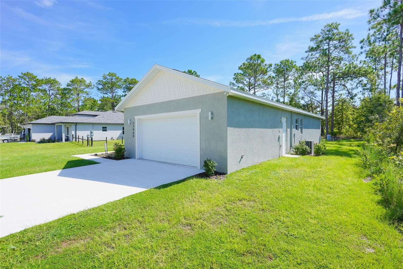 Front Exterior - 17460 MACASSAR RD, WEEKI WACHEE