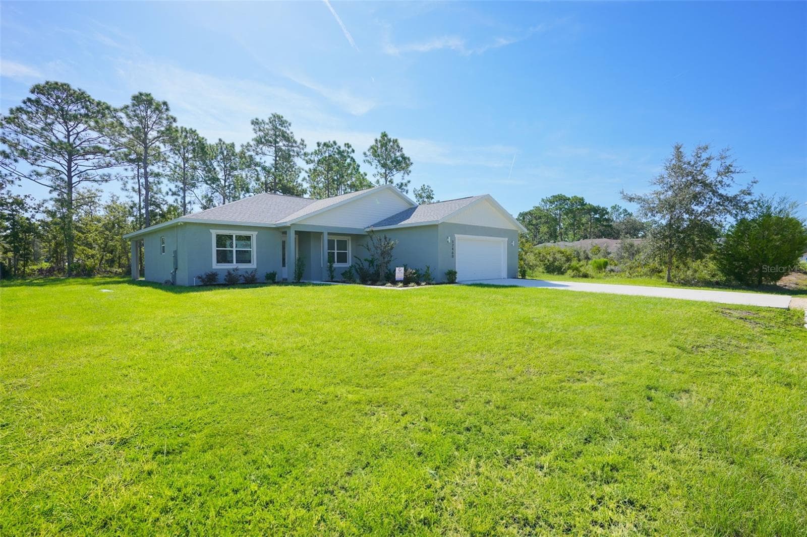 Front Exterior - 17460 MACASSAR RD, WEEKI WACHEE