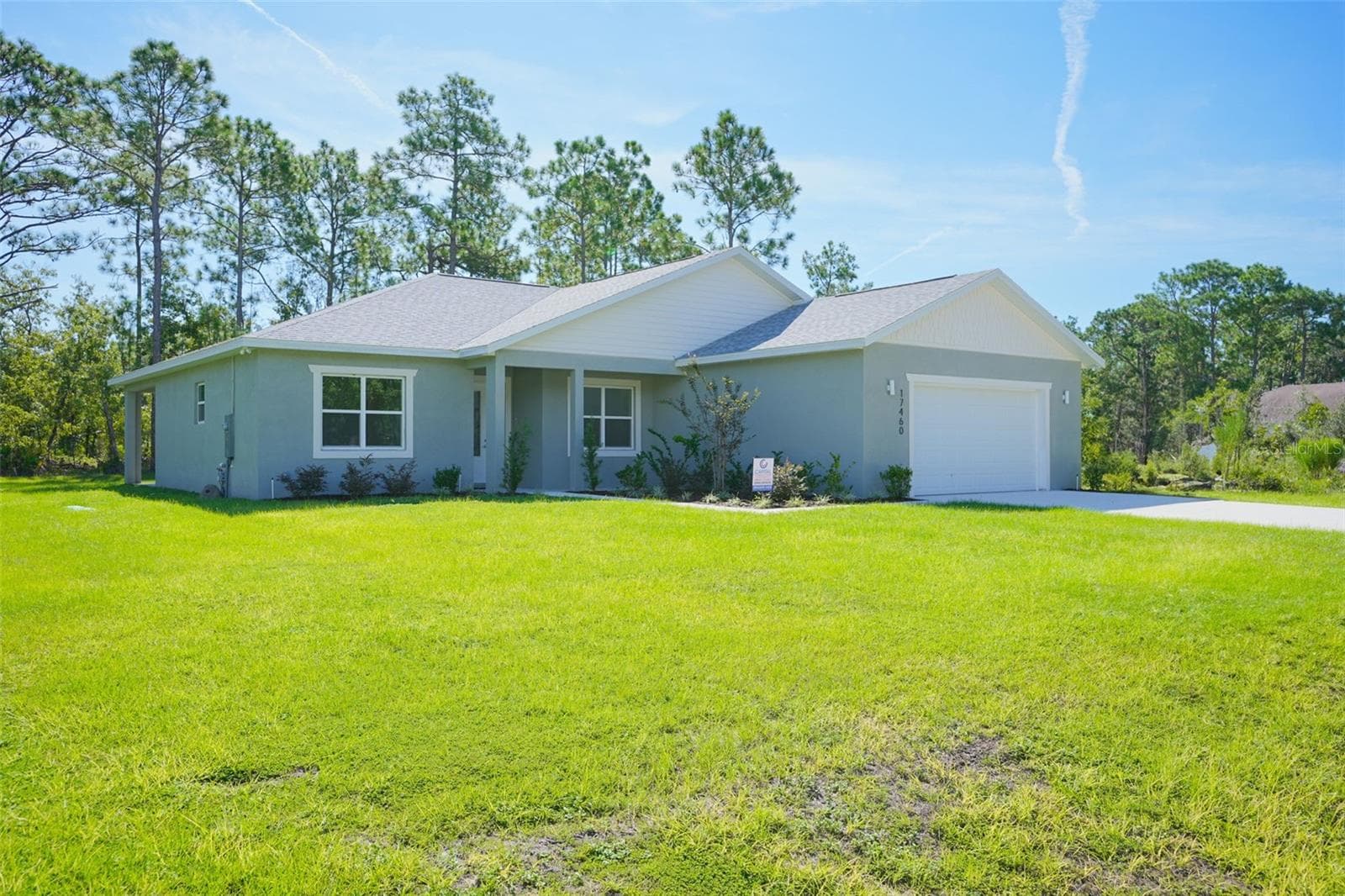 Front Exterior - 17460 MACASSAR RD, WEEKI WACHEE