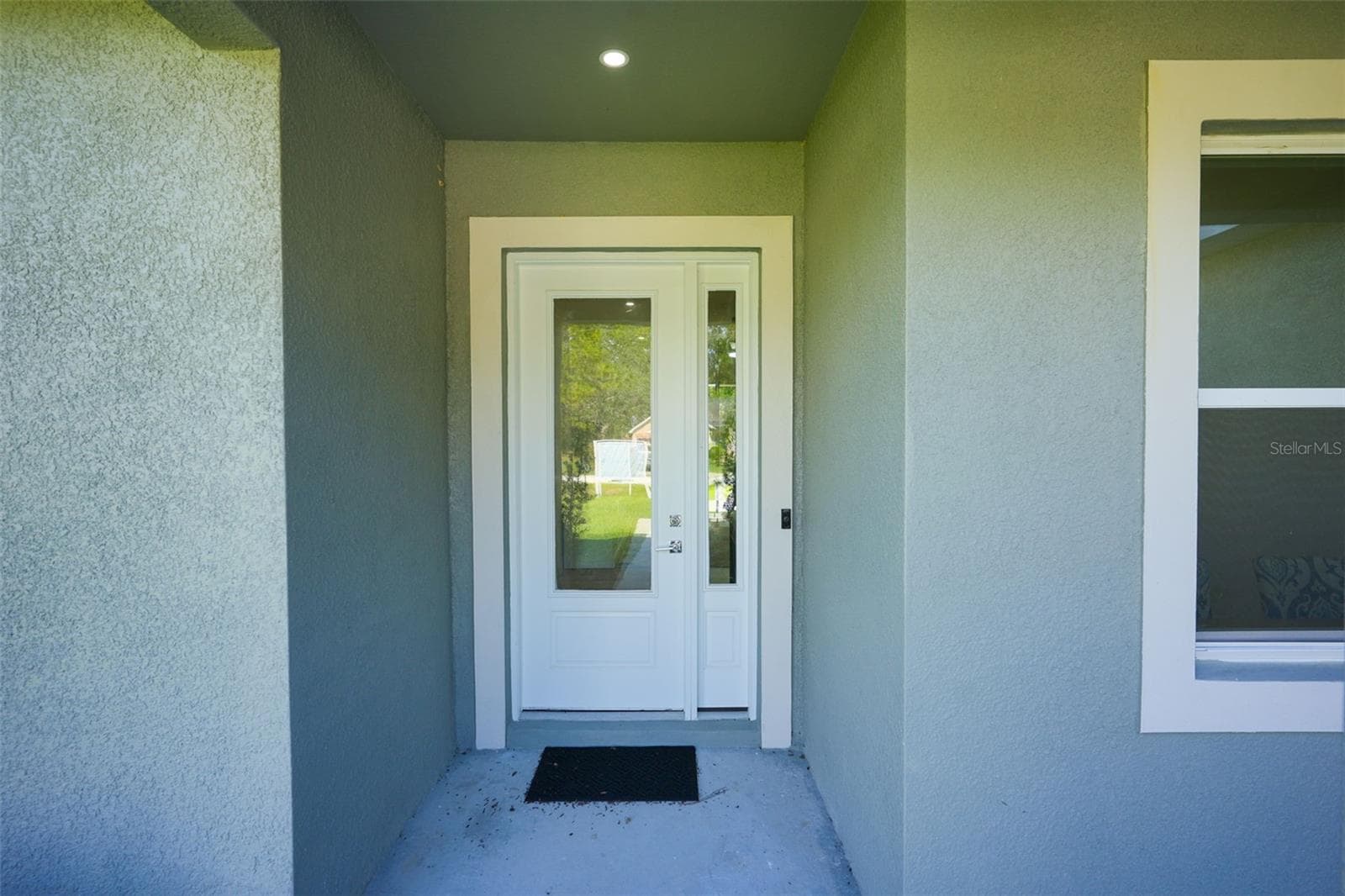 Front Exterior - 17460 MACASSAR RD, WEEKI WACHEE