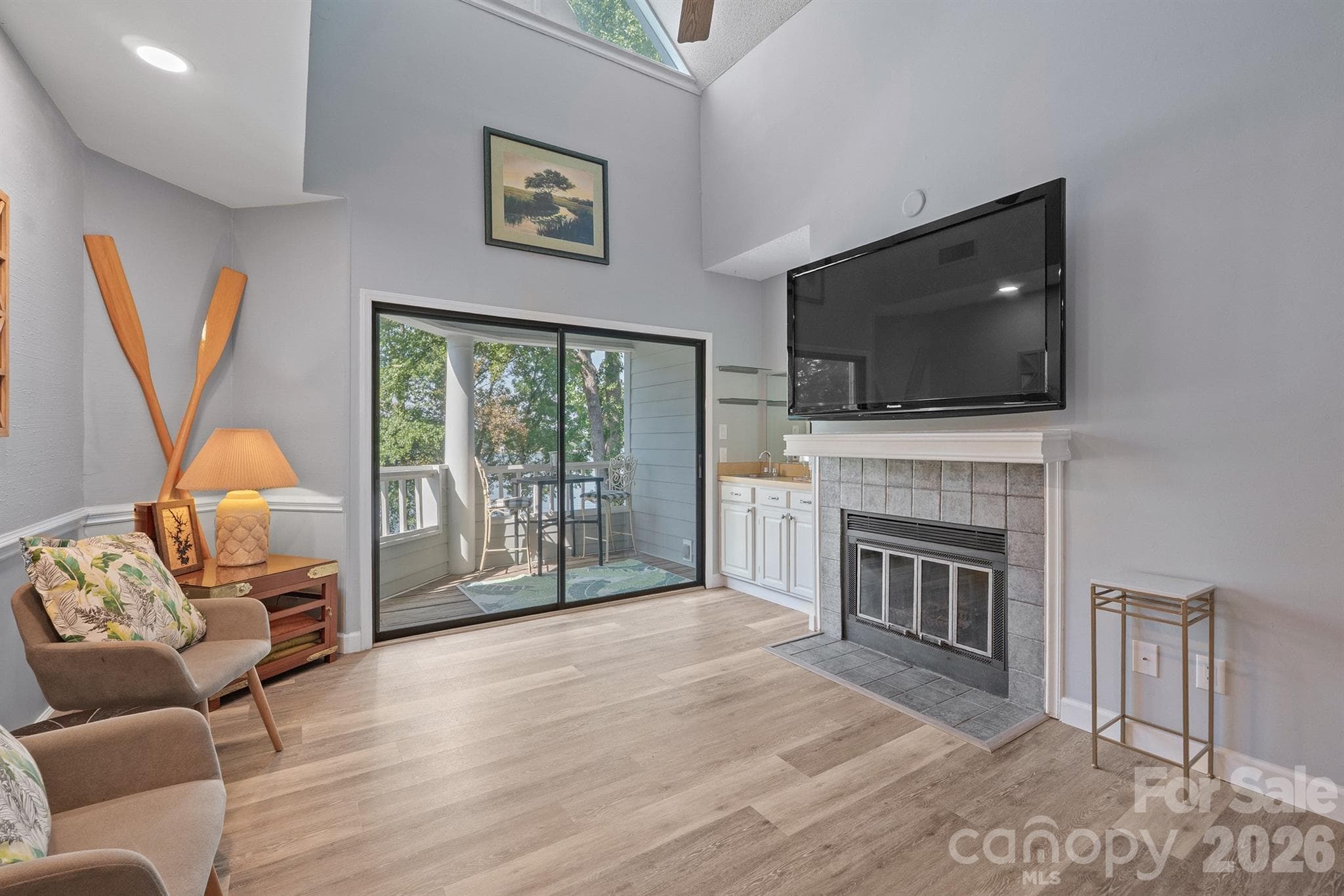 Seller added extra lighting in the soffit on the left for more brightness - 327 Northwest Drive, Davidson