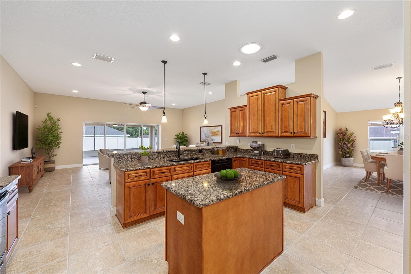 Kitchen anchors this floorplan - 915 SE 69TH AVE, OCALA