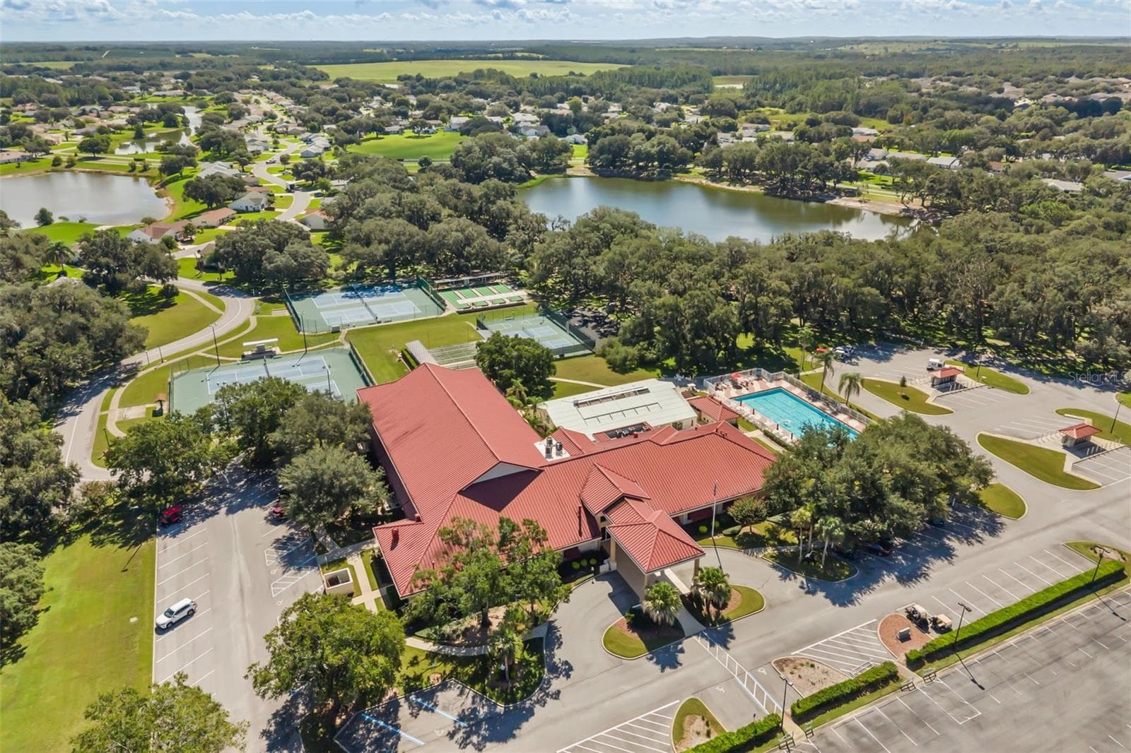 Clubhouse with outdoor pool, tennis, pickle ball and bocce ball courts; lakes for catch & release fishing - 5536 ROSEWALL CIR, LEESBURG