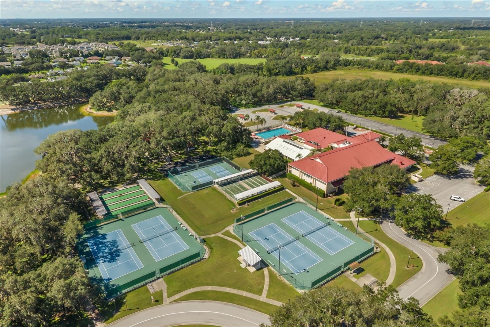 Clubhouse with outdoor pool, tennis, pickle ball and bocce ball courts, shuffleboard - 5536 ROSEWALL CIR, LEESBURG