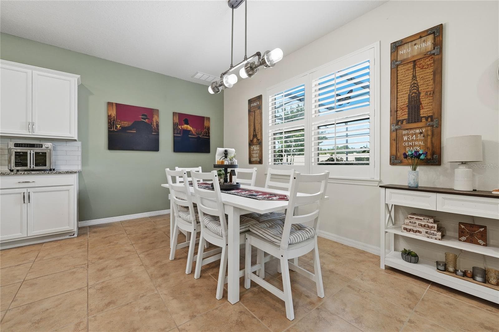 Separate breakfast area off the kitchen, overlooking the pool. - 2873 MATERA DR, ST CLOUD