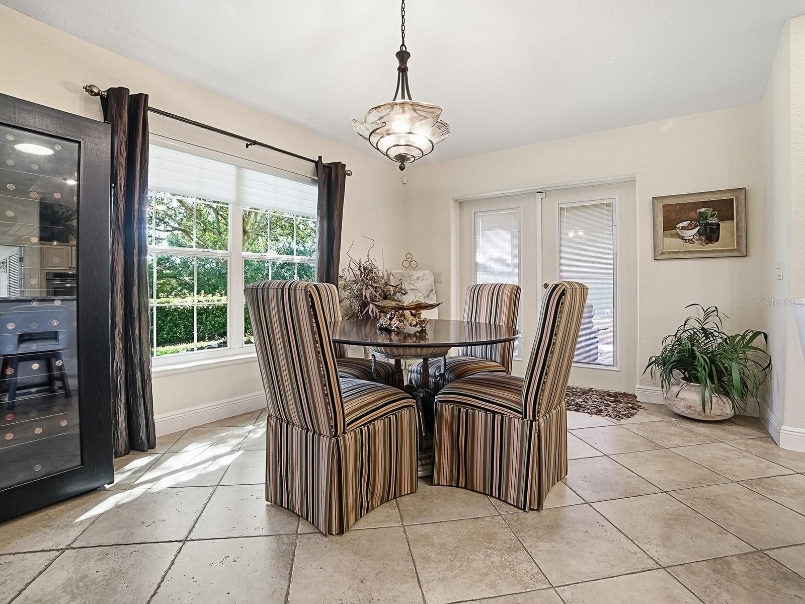 EAT IN KITCHEN WITH NATURAL SUNLIGHT POURING IN AND DOORS TO THE SIDE LANAI - 1089 VANCE TRL, THE VILLAGES