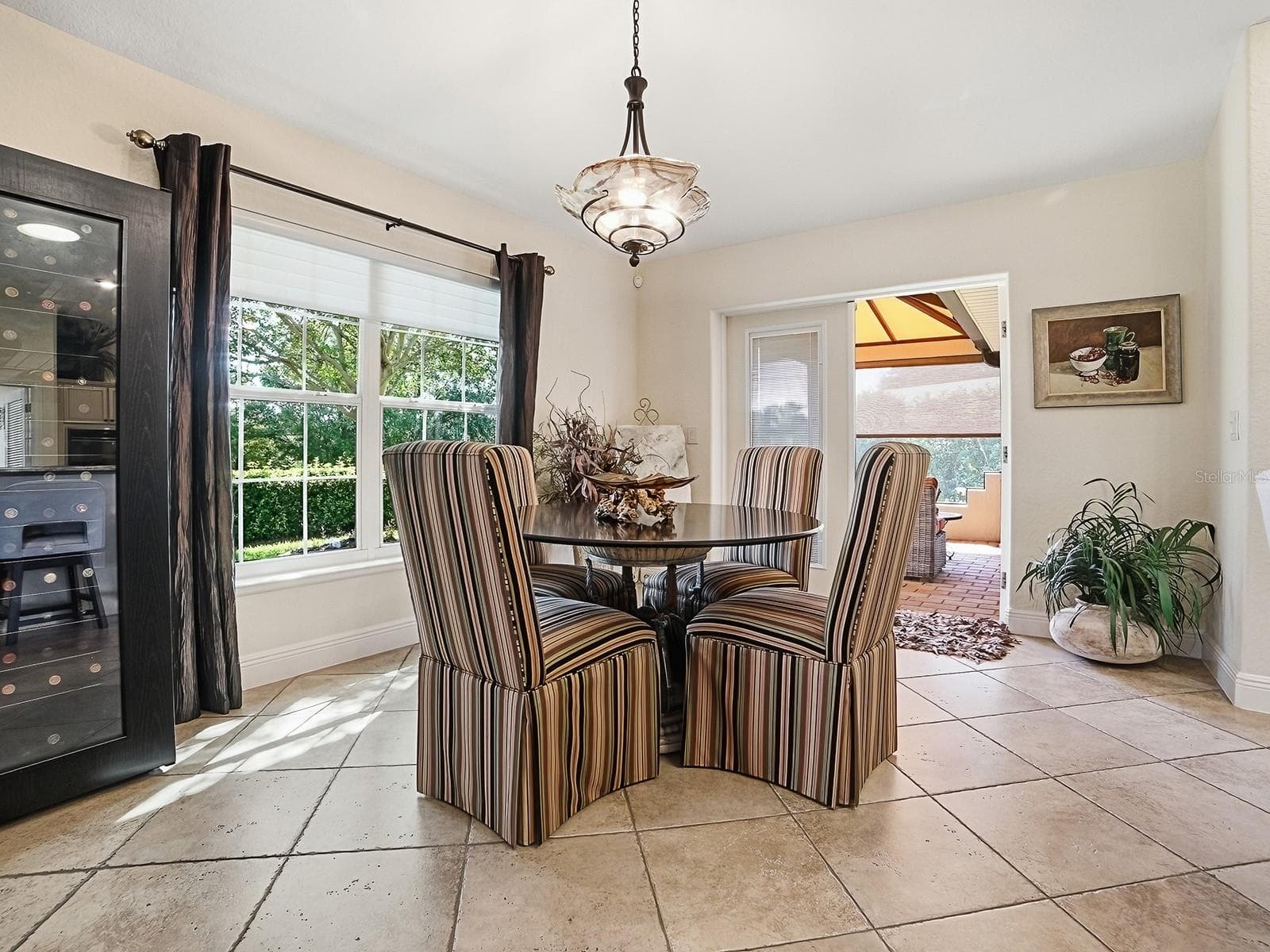 OPEN DOOR TO THE SIDE LANAI - 1089 VANCE TRL, THE VILLAGES