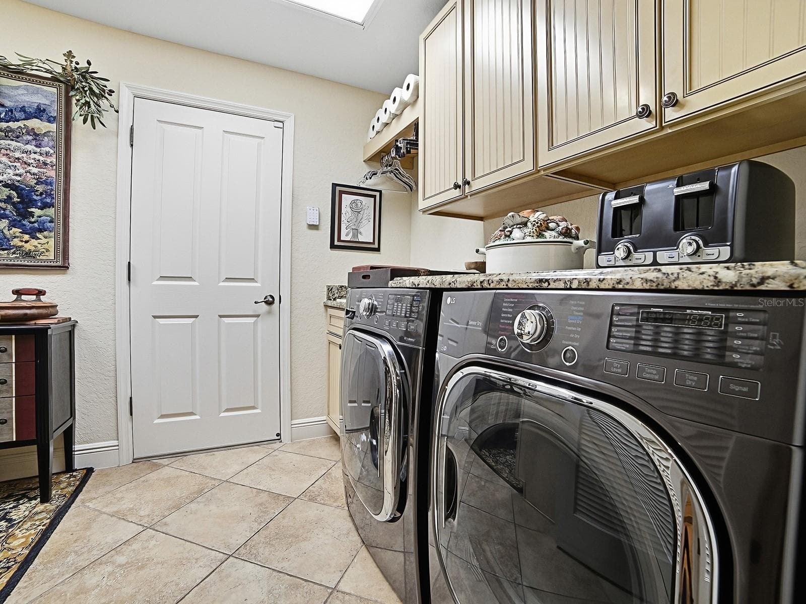 SPACIOUS LAUNDRY ROOM WITH HIGH END WASHER/DRYER - 1089 VANCE TRL, THE VILLAGES