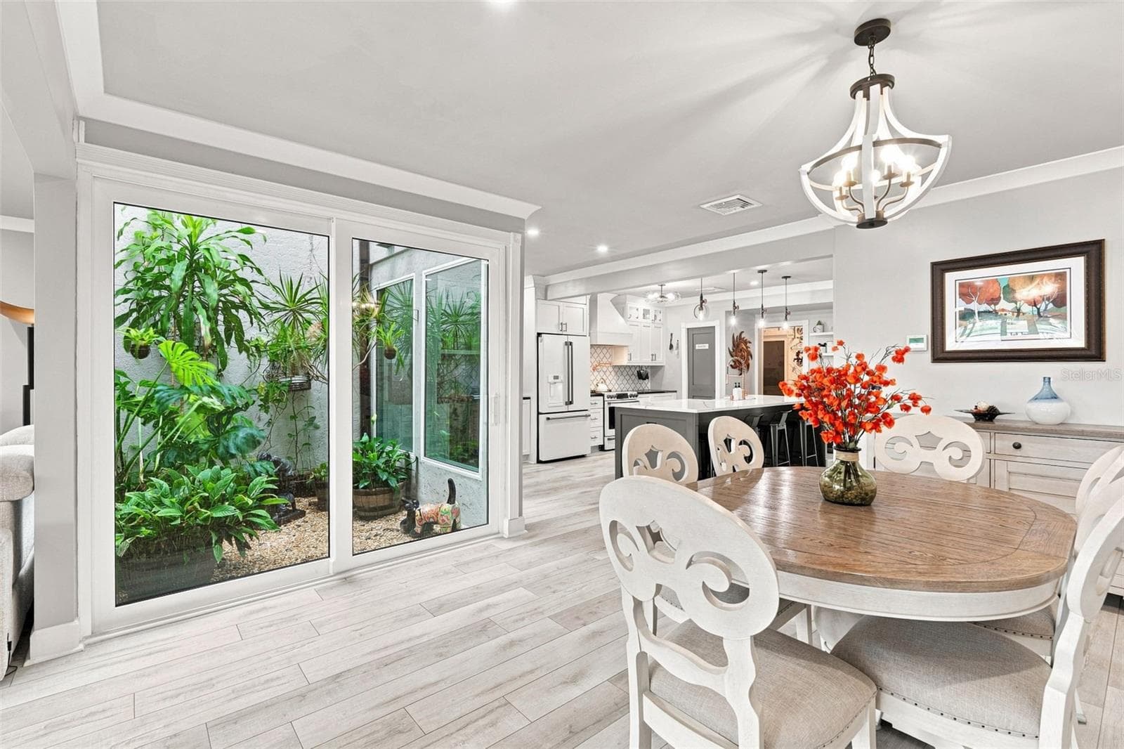 Dinette With Atrium Views - 12918 SW DOUG DR, LAKE SUZY