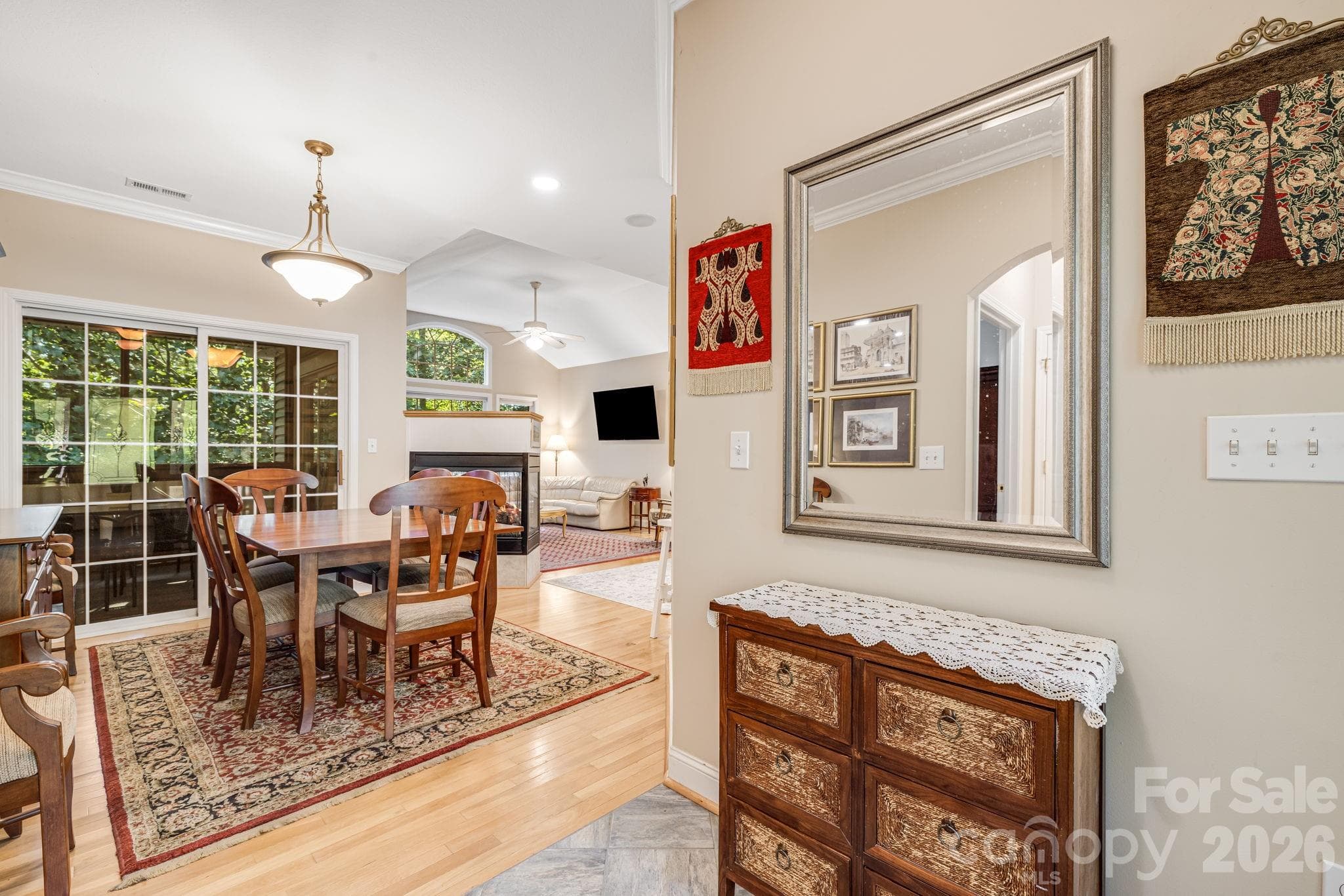 A partially open plan with designated areas that flow into each other. Lots of windows for nature come in. - 212 Carriage Springs Way, Hendersonville