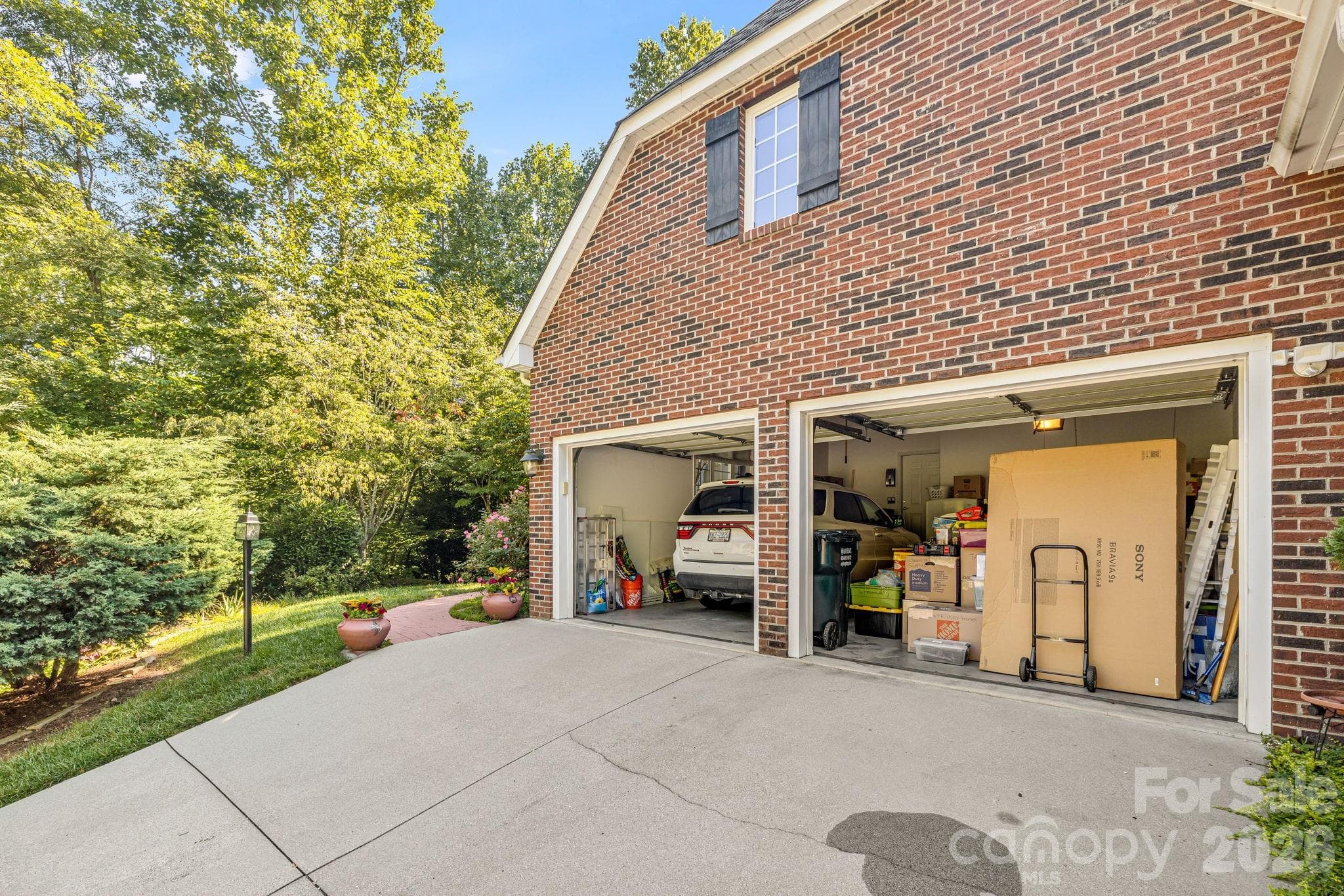 Look how much this garage holds.  Ready to move! - 212 Carriage Springs Way, Hendersonville