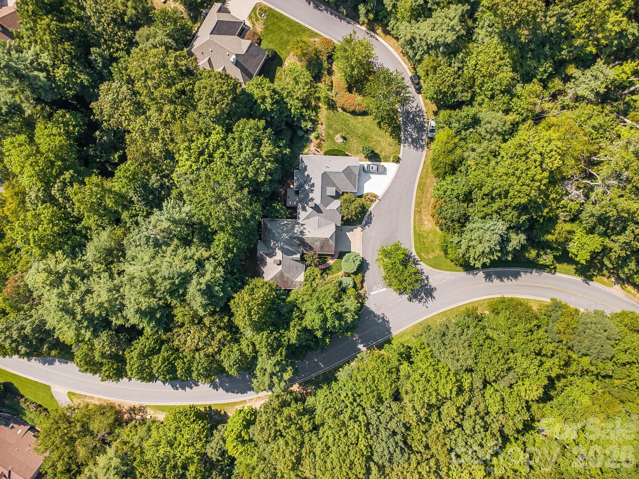 Home is on the corner of Carriage Parkway and Carriage Springs Way. - 212 Carriage Springs Way, Hendersonville