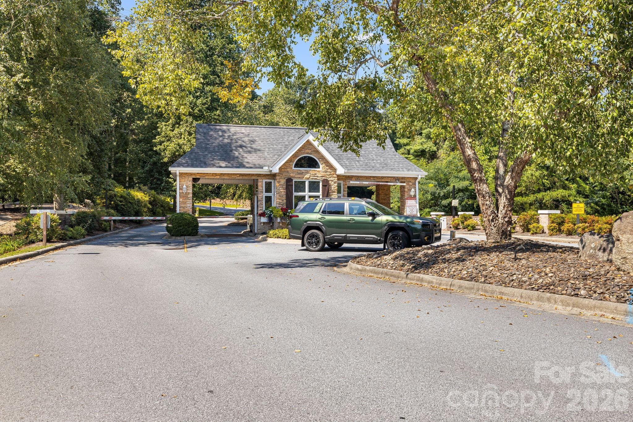 This can be the gatehouse entrance to your new home. - 212 Carriage Springs Way, Hendersonville