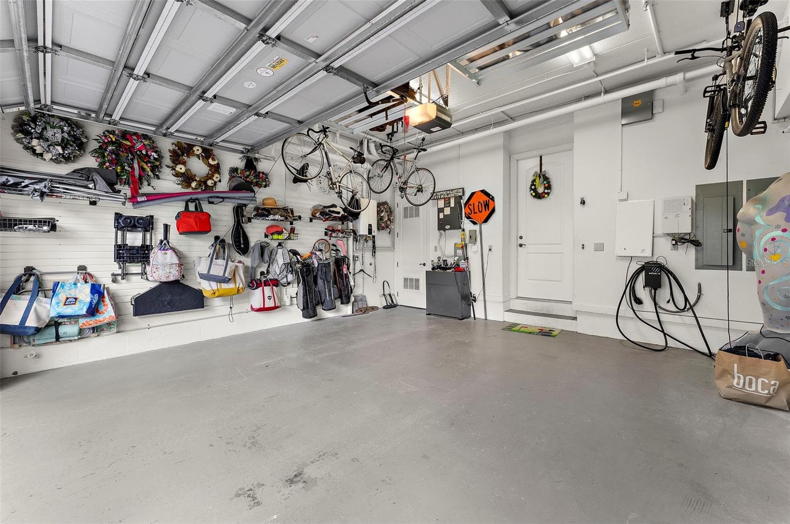 Private 2 car garage with storage + activity wall - 235 COCOANUT AVE #101A, SARASOTA