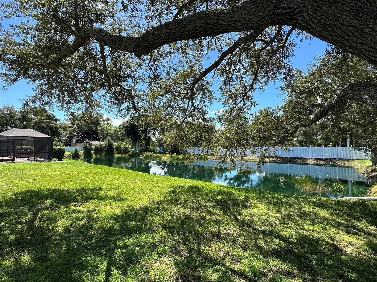 Backyard pond view - 2404 50TH DR E, BRADENTON