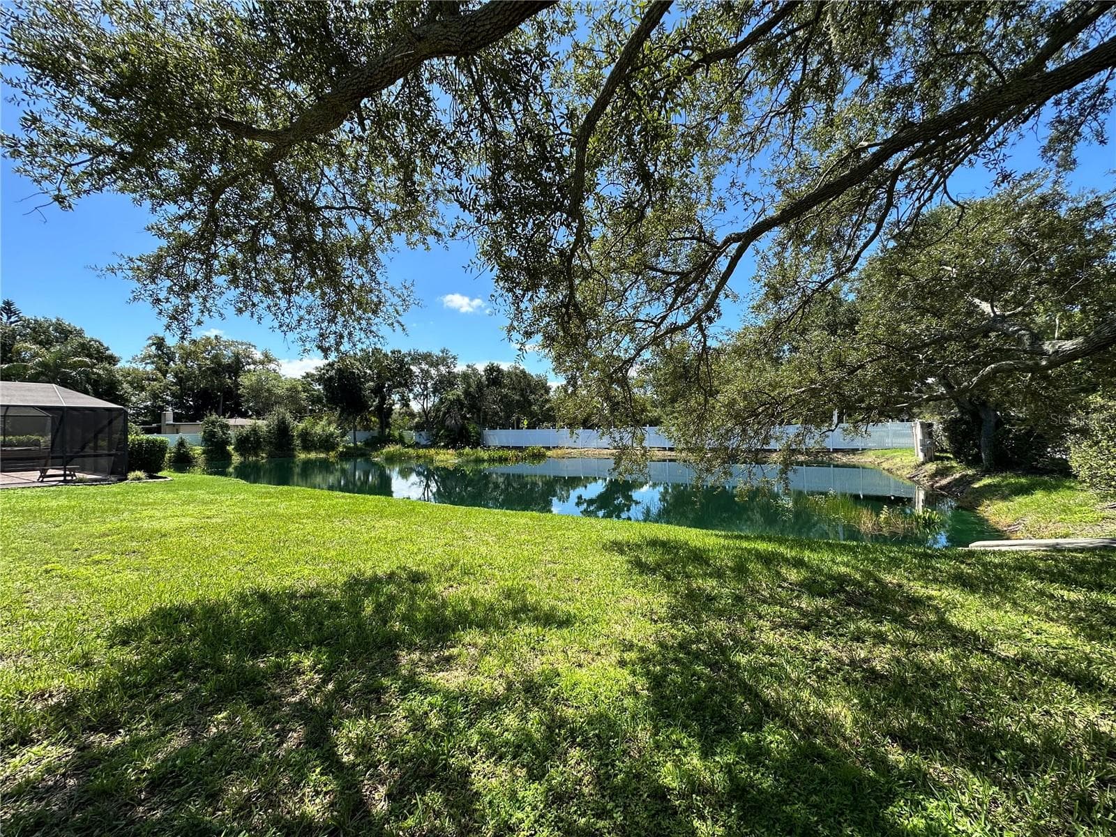 Backyard pond view - 2404 50TH DR E, BRADENTON