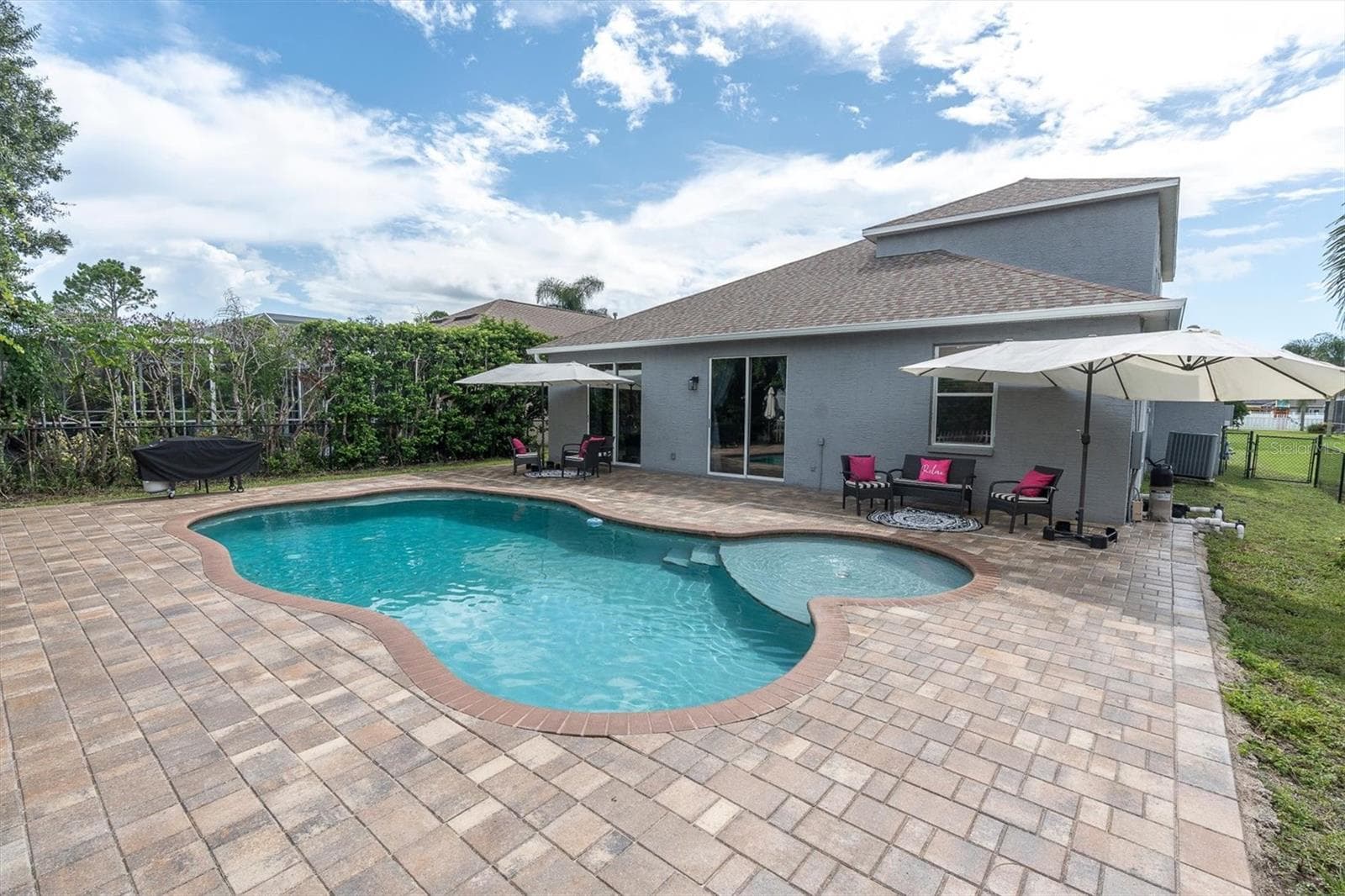 SPACIOUS PAVER DECK AND GLISTENING POOL - 1913 TILDEN PL, TRINITY