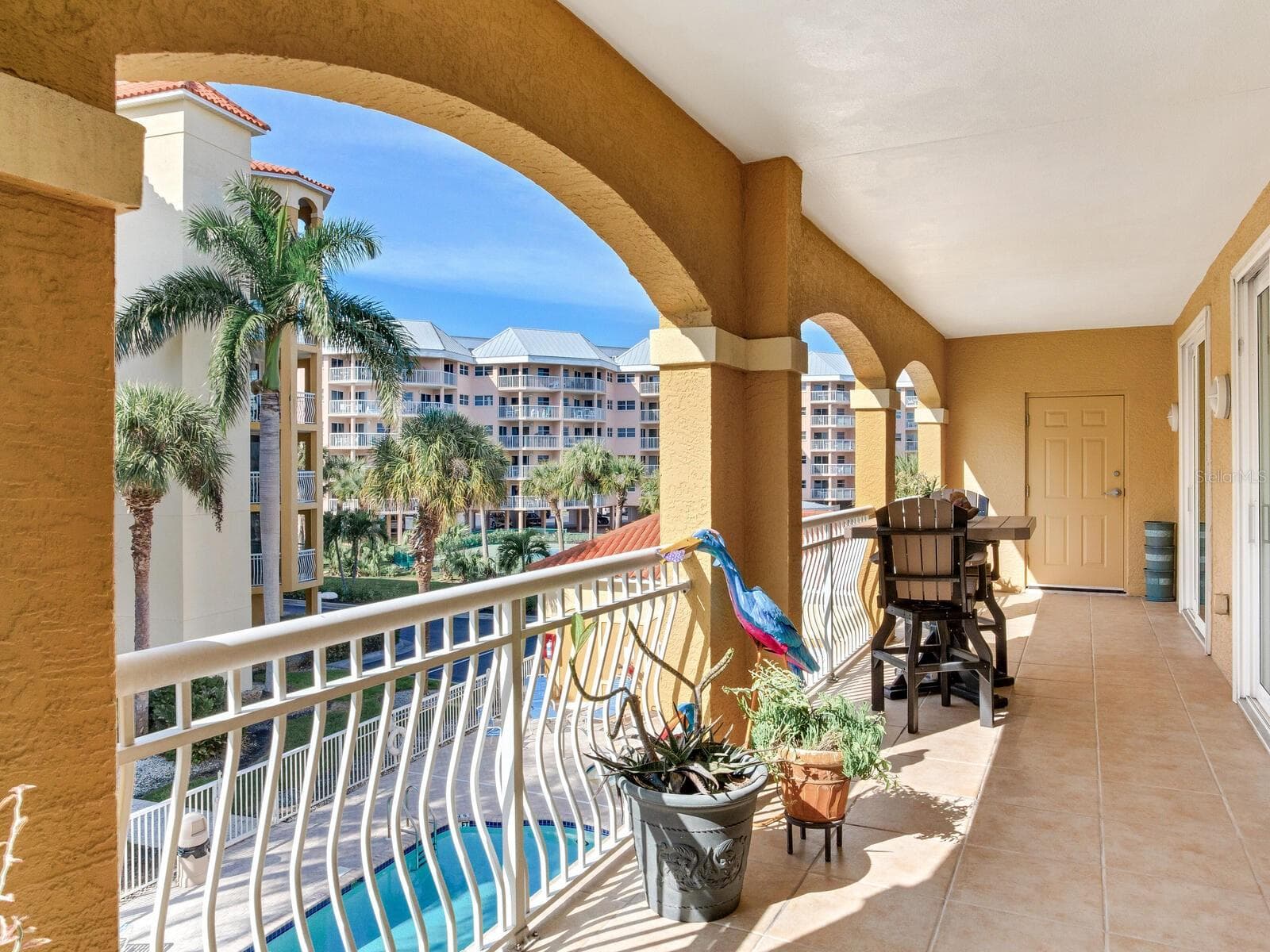 Large doublebalcony poolside - 5353 GULF BLVD #B202, ST PETE BEACH