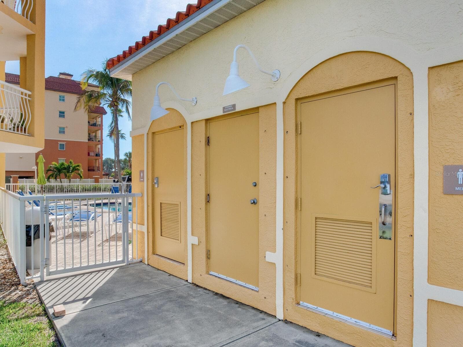 His and Hers Restrooms poolside - 5353 GULF BLVD #B202, ST PETE BEACH