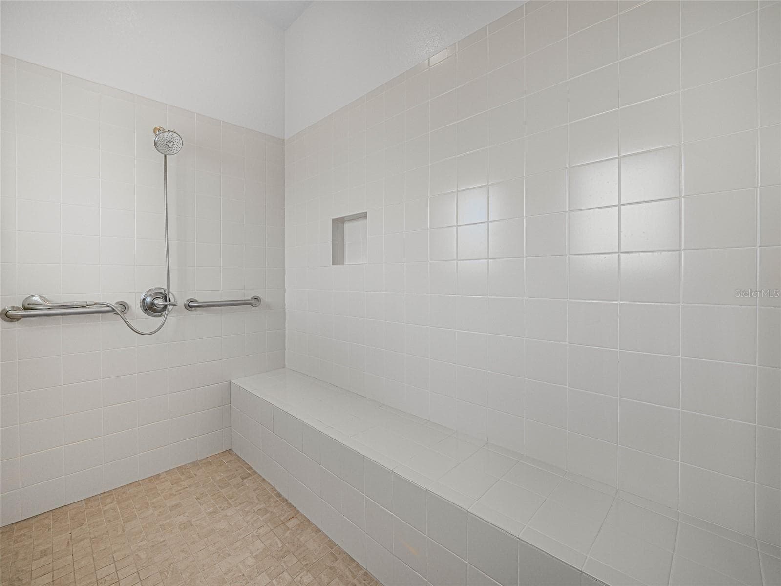 Primary Walk In Shower with Bench - 6136 PEBBLE BEACH BLVD, WINTER HAVEN