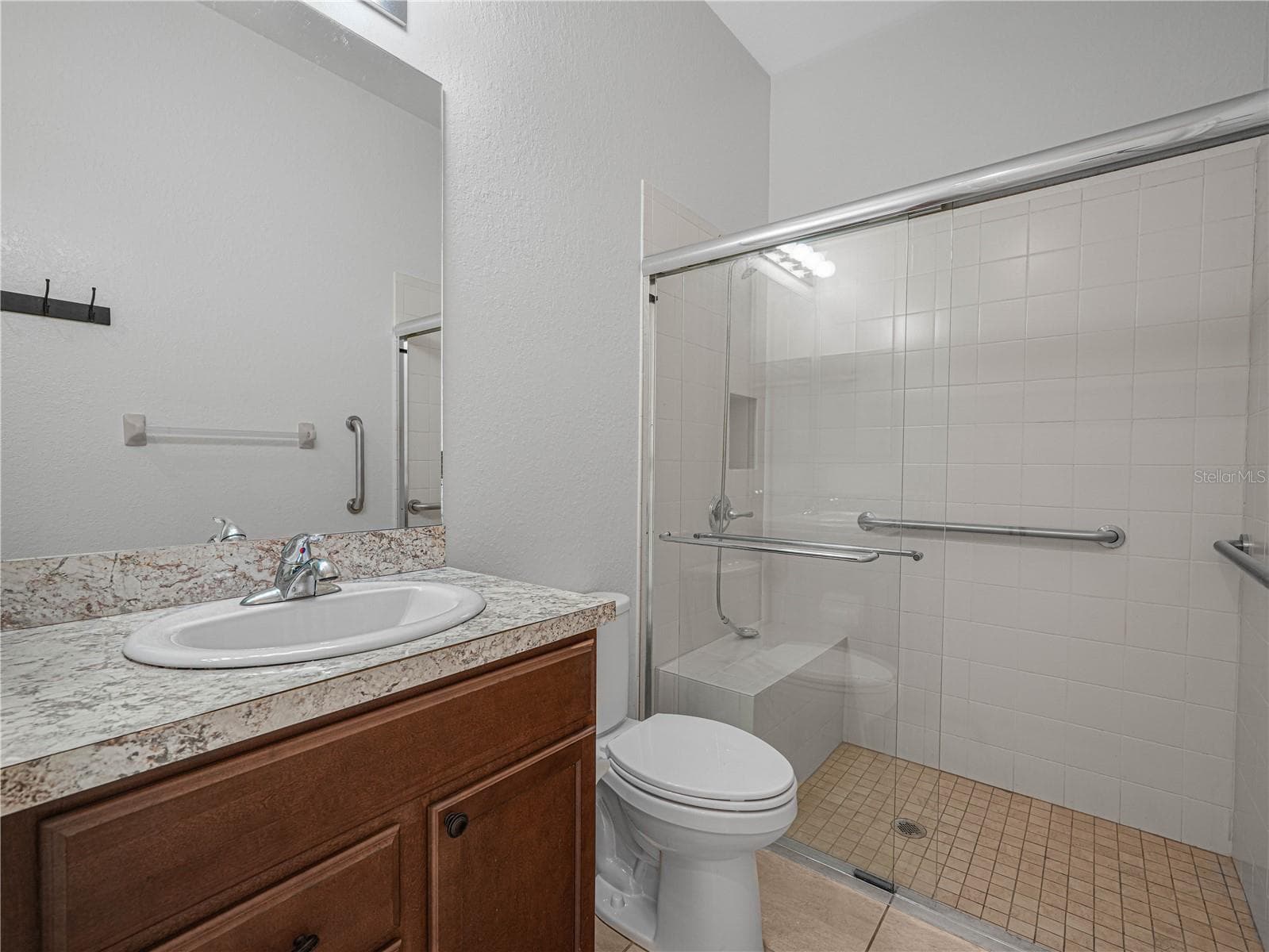 2nd Primary Suite Bath with Walk In Shower and Glass Enclosure - 6136 PEBBLE BEACH BLVD, WINTER HAVEN