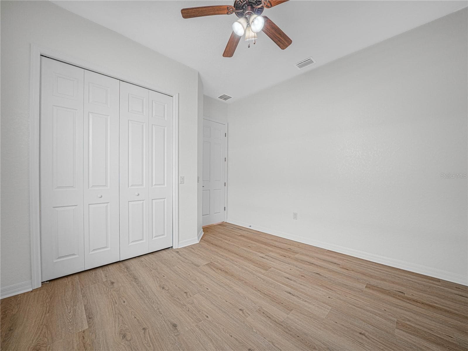 Bedroom 3 Closet - 6136 PEBBLE BEACH BLVD, WINTER HAVEN