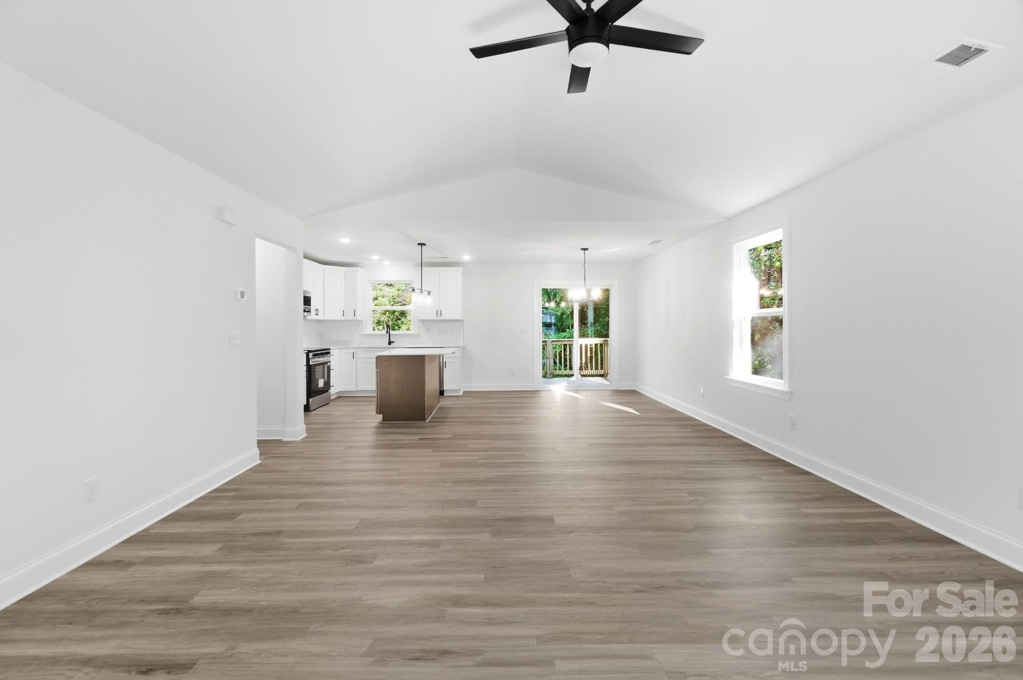 View of Living Room, Dining Room and Kitchen with breakfast bar - 1074 Mountain Crest Drive, Kings Mountain